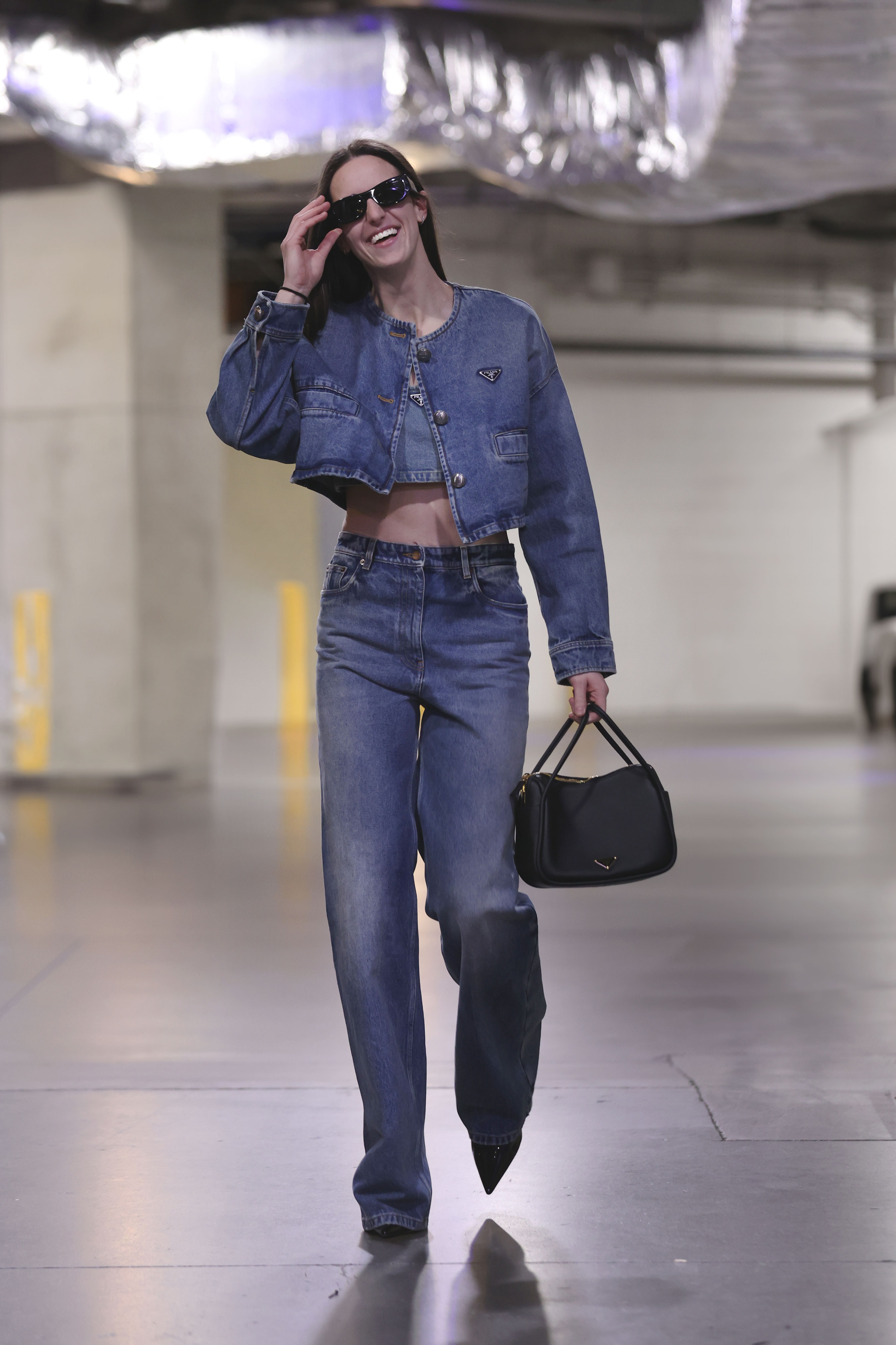Caitlin Clark #22 of the Indiana Fever arrives to the arena before the game against the Chicago Sky on June 16, 2024 at Gainbridge Fieldhouse in Indianapolis, Indiana.