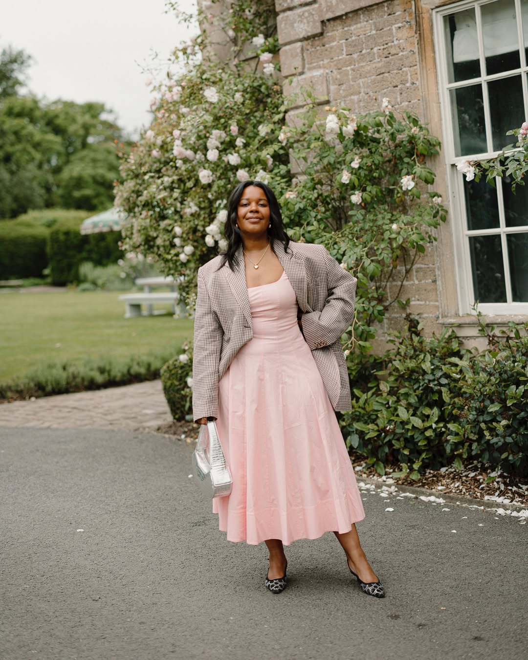 @styleidealist wears a Staud Wells dress in light pink