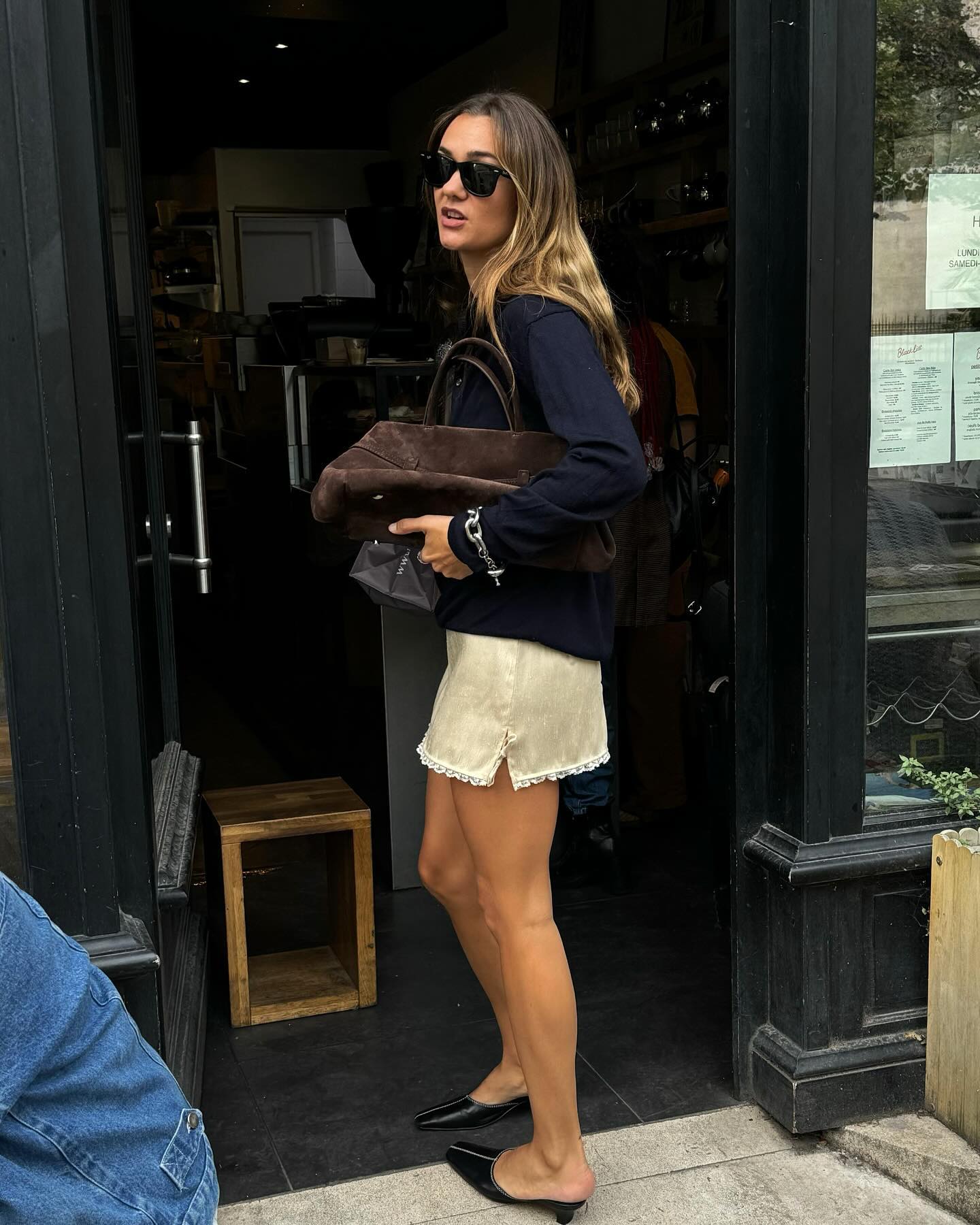 How a French woman styles a slip skirt.