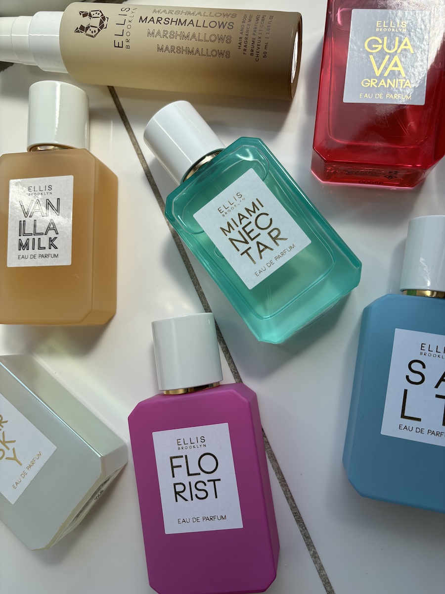 An assortment of the best Ellis Brooklyn perfumes on the bathroom counter