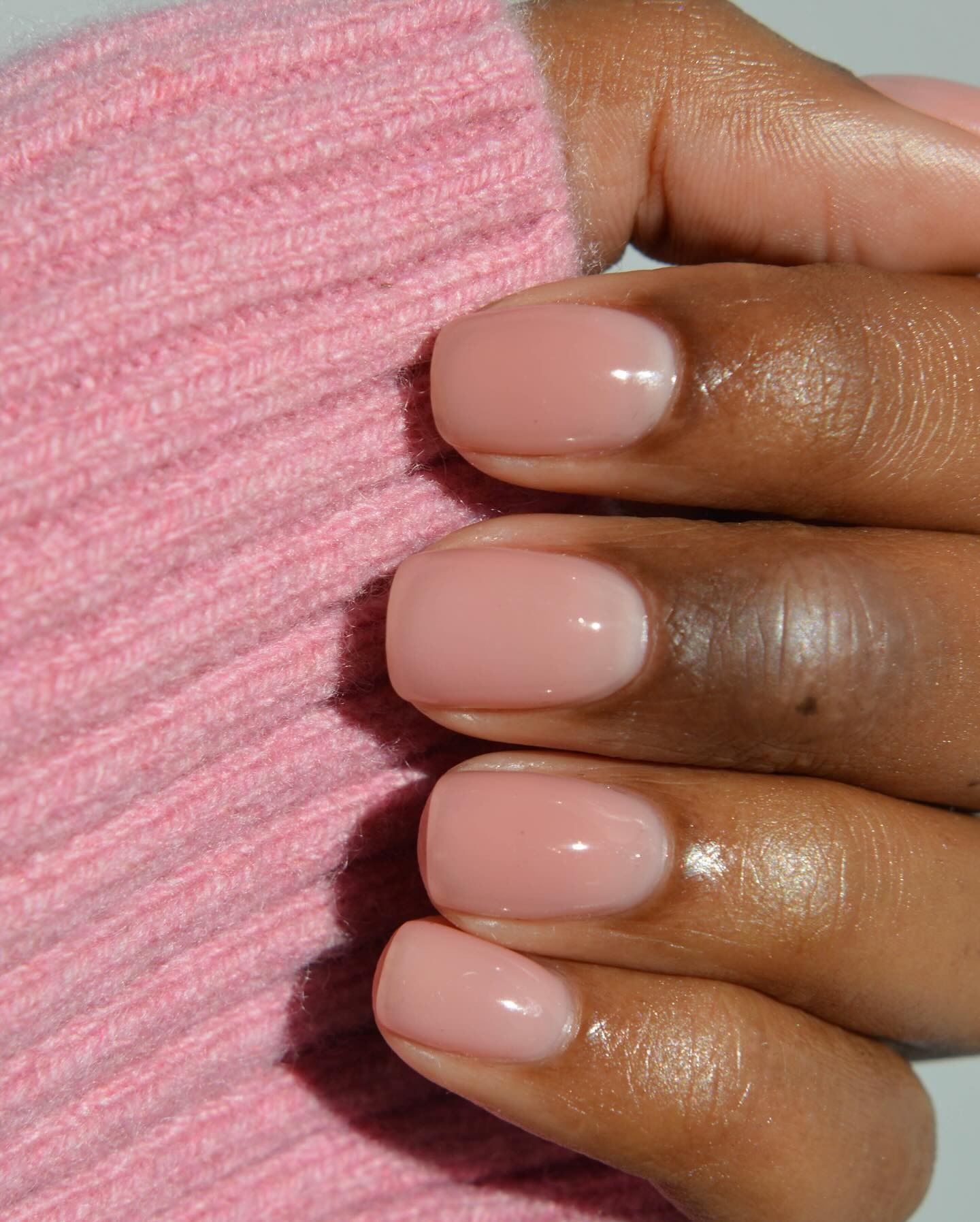 Woman with simple, clean nails.