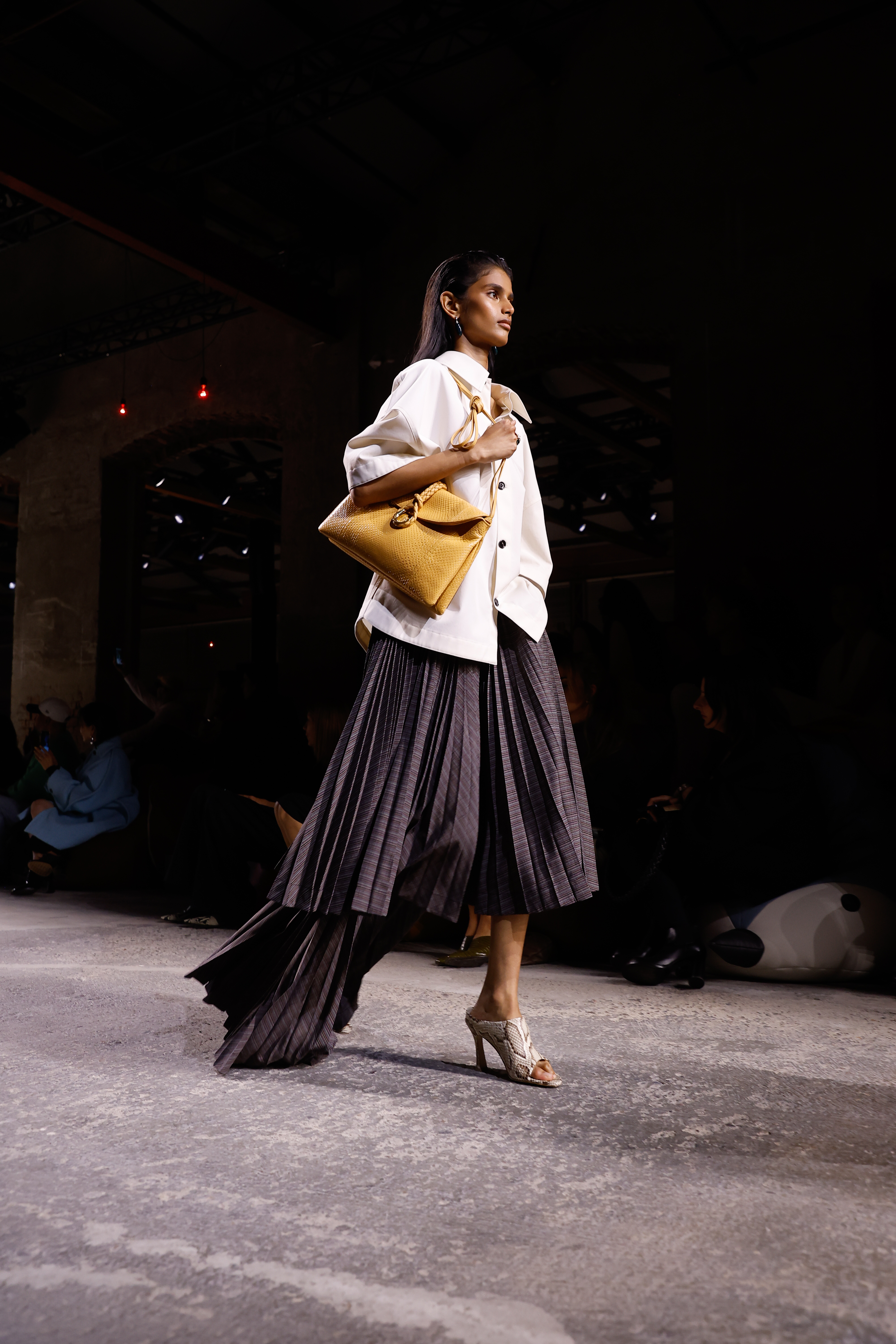 An image of a woven leather bag.