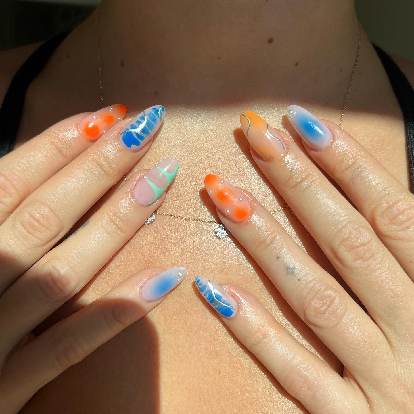 Blue and orange nail art