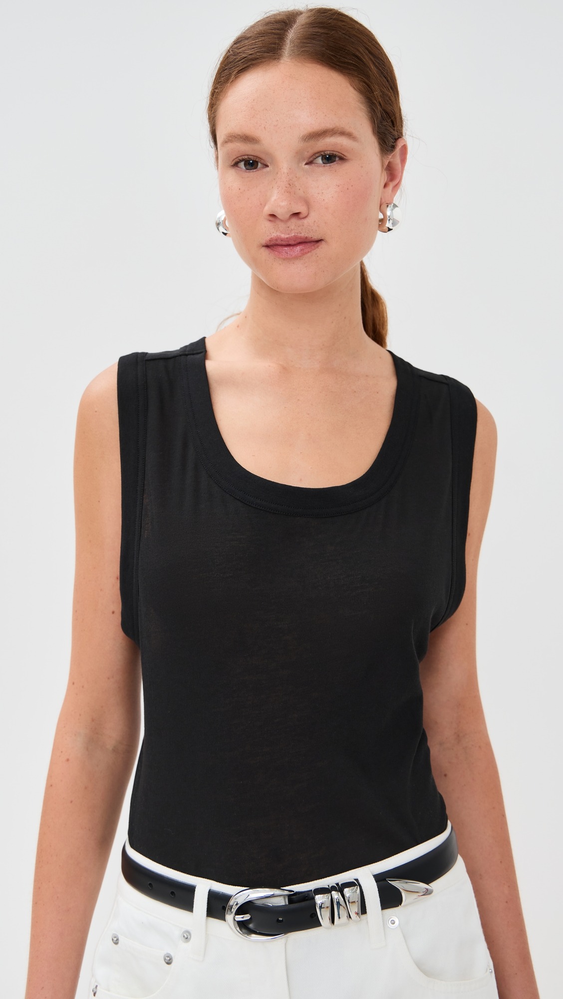 Woman wearing black tank top