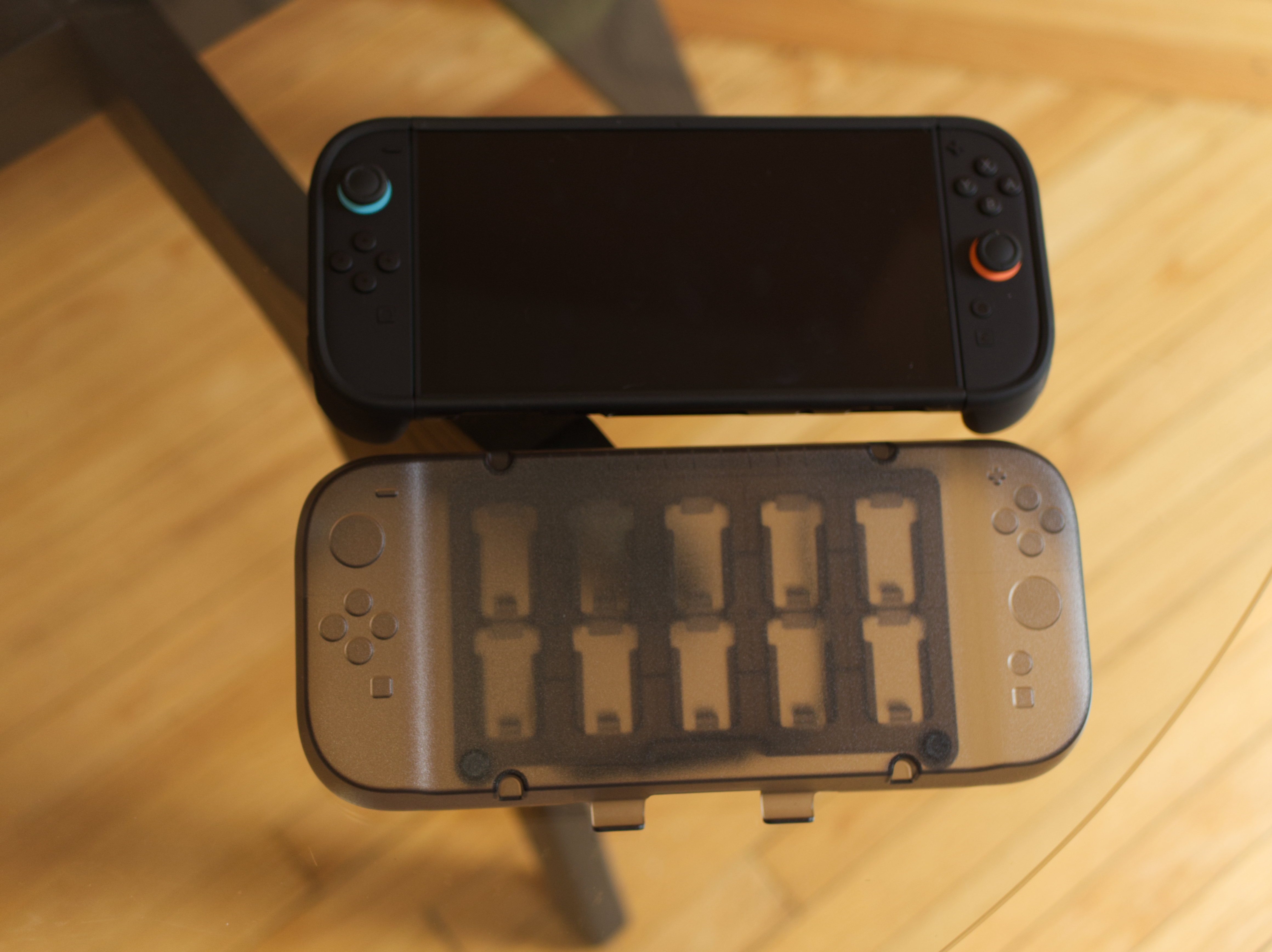 The transparent front cover is included with the $80 Travel tier, and it includes a tray that holds 10 cartridges.