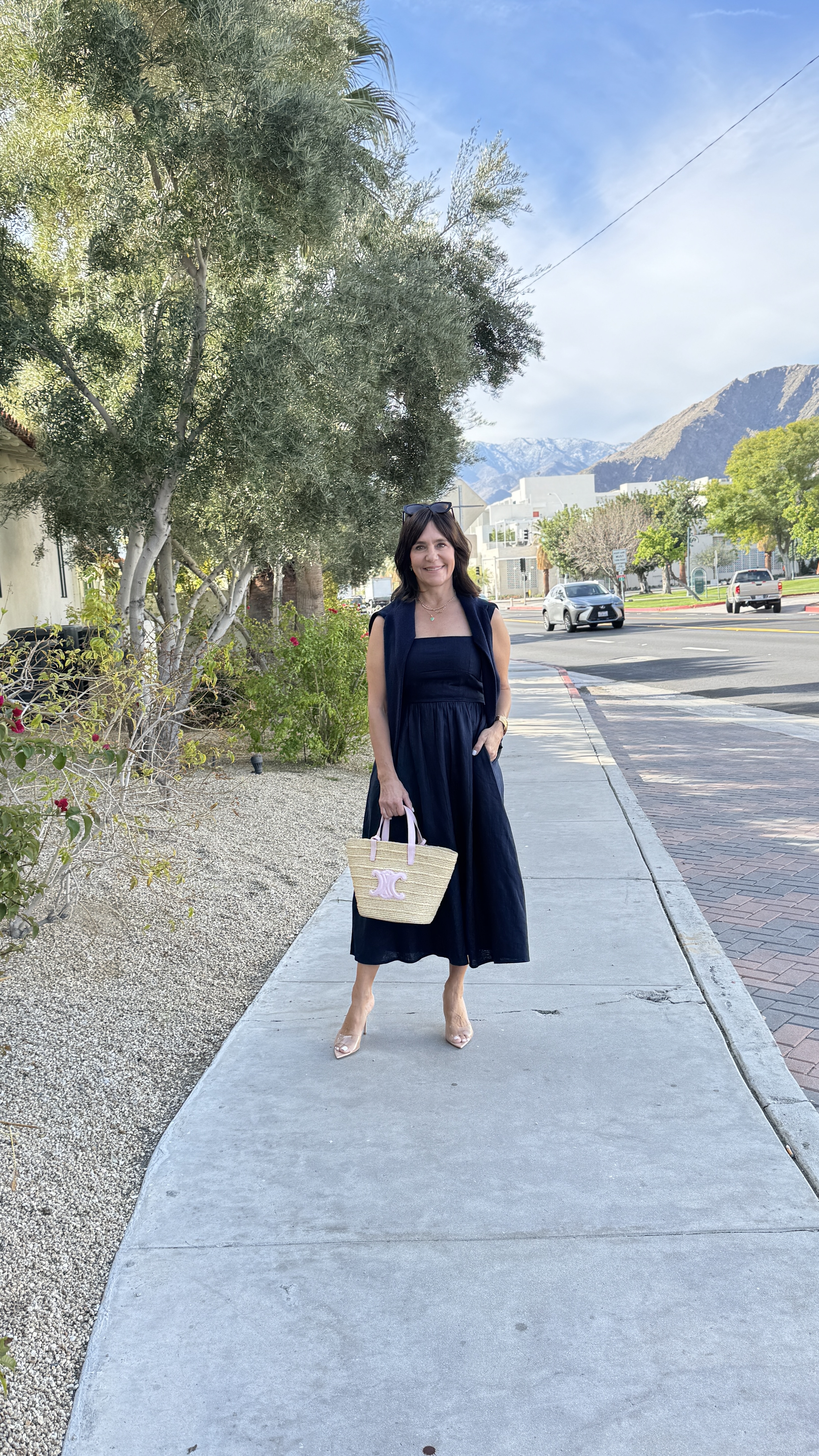 A Nordstrom buyer wearing a linen dress.