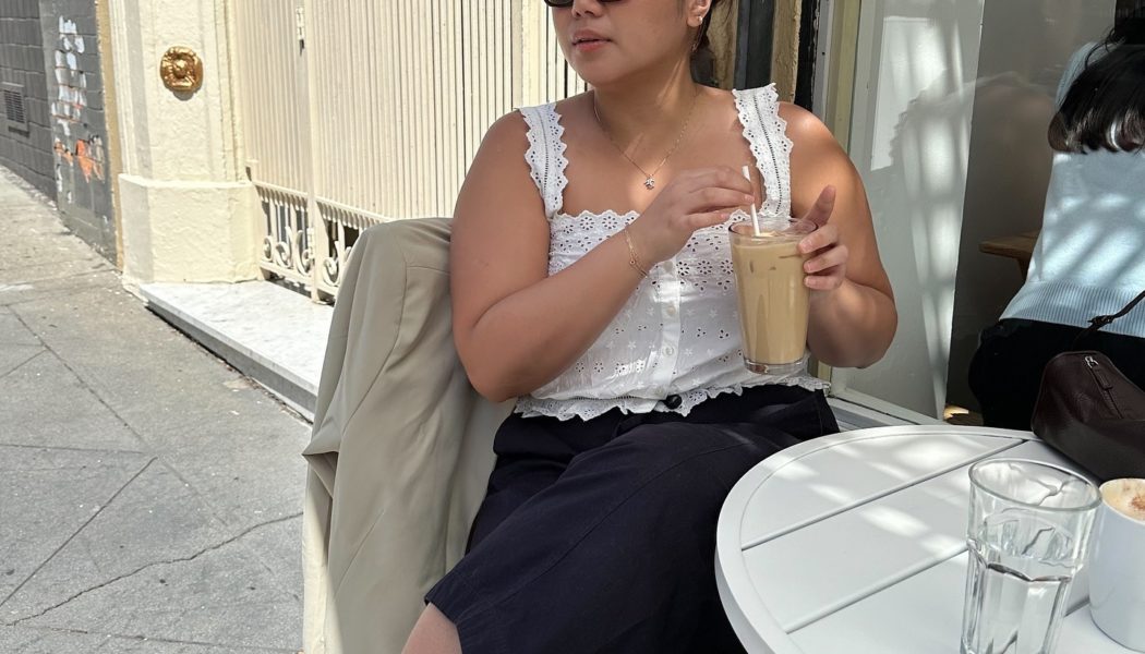 Instead of T-shirts, Fashion People Are Wearing This Throw-on White Blouse Trend With Denim and Skirts