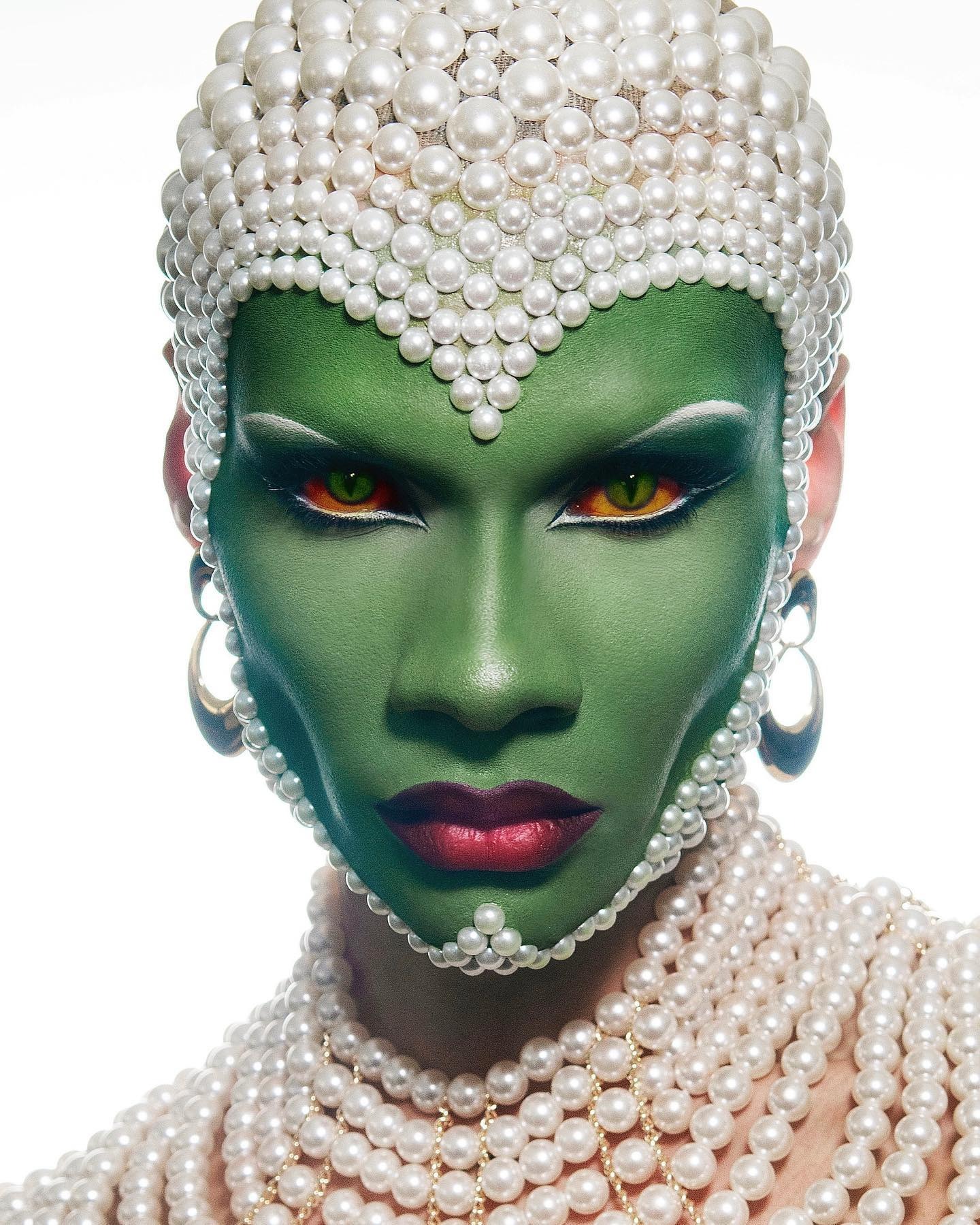Photo of Kauv wearing maximalist makeup