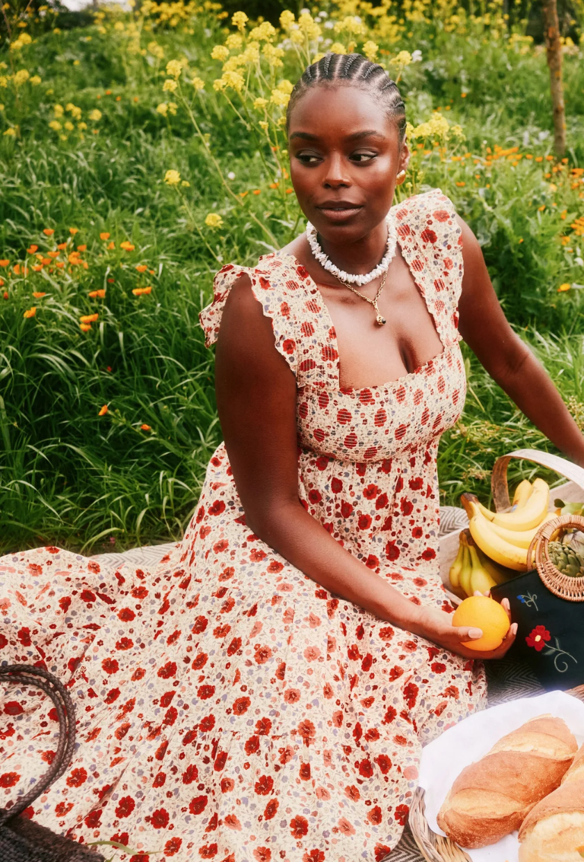 An image of a floral waisted maxi dress from Rixo.