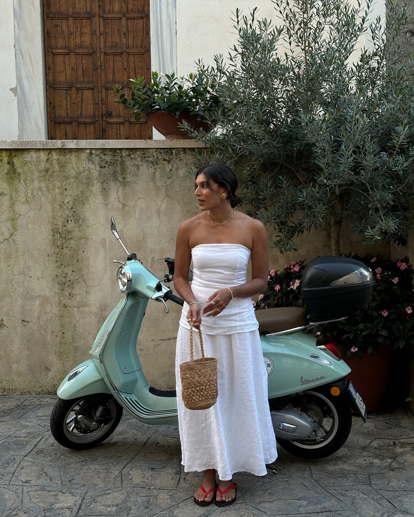 An image of @theindiaedit wearing a waisted dress from DISSH.