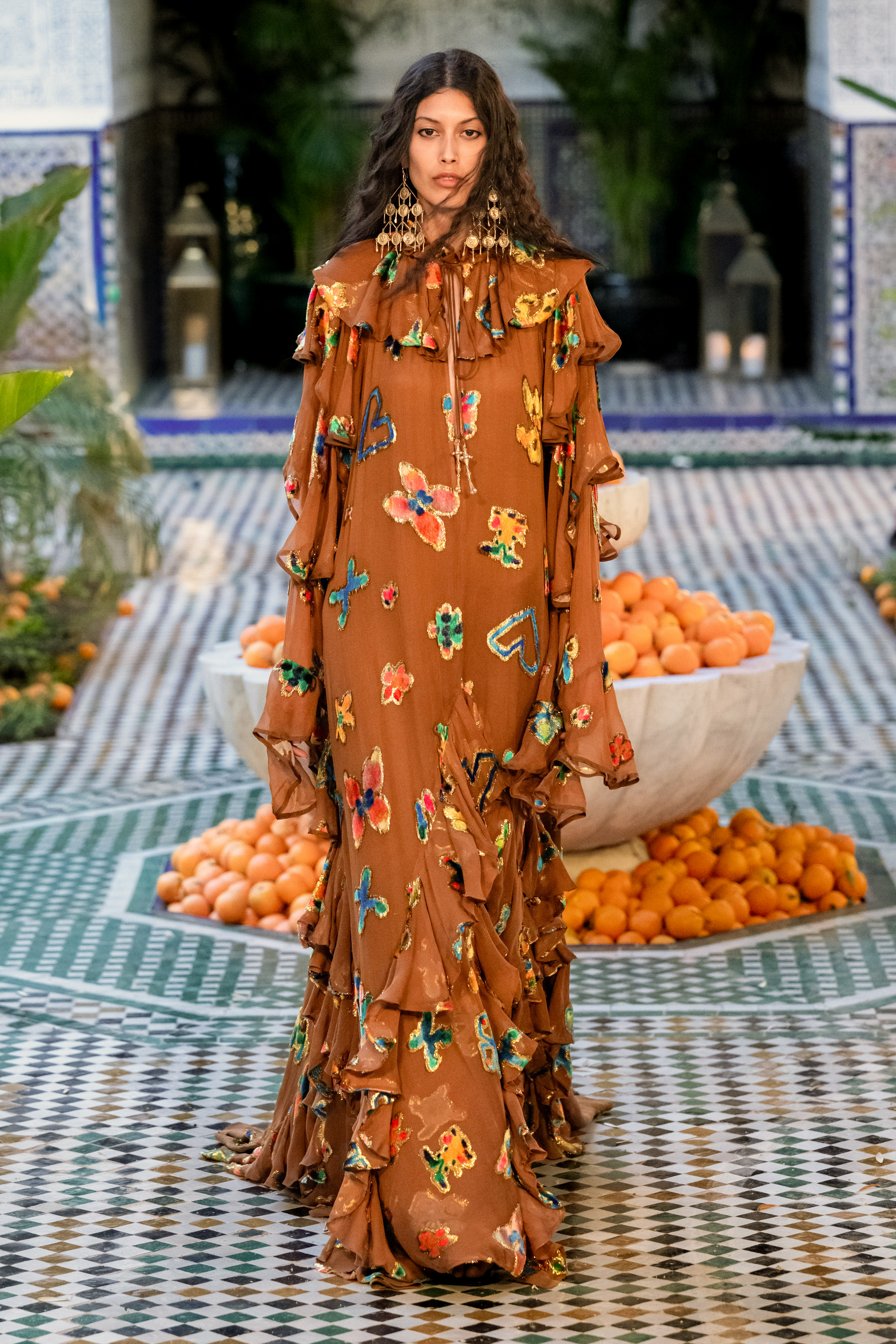 Alemais model showcasing the caftan trend.