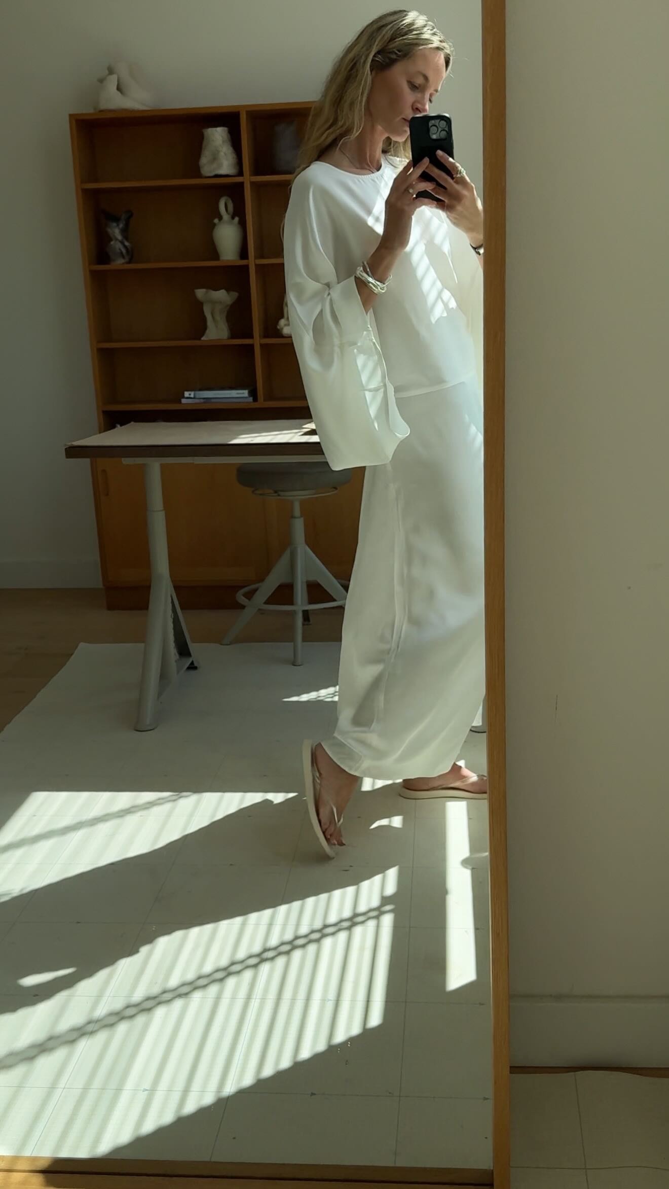 Anouk Yve wearing a caftan dress.