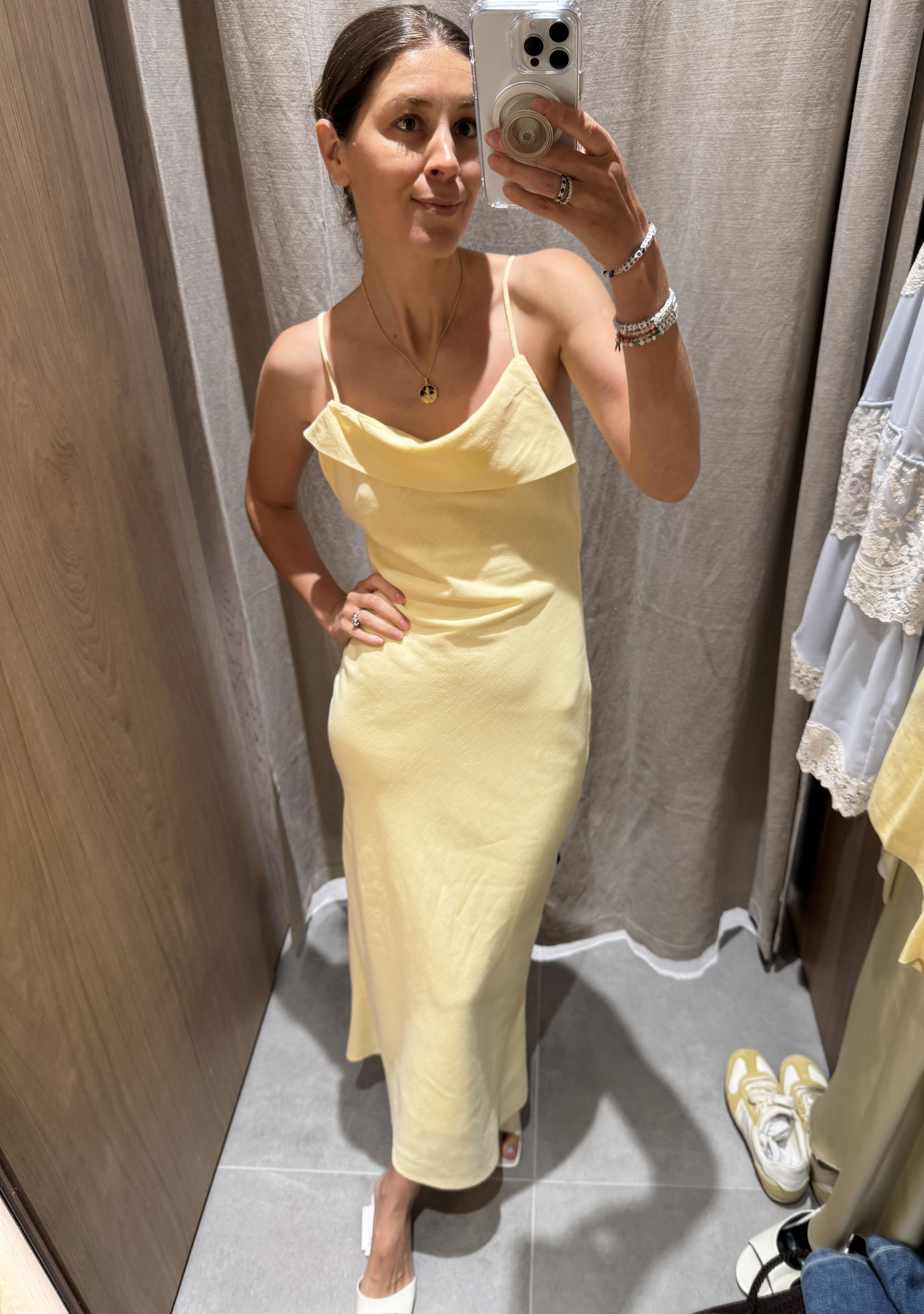 Woman in yellow linen maxi dress