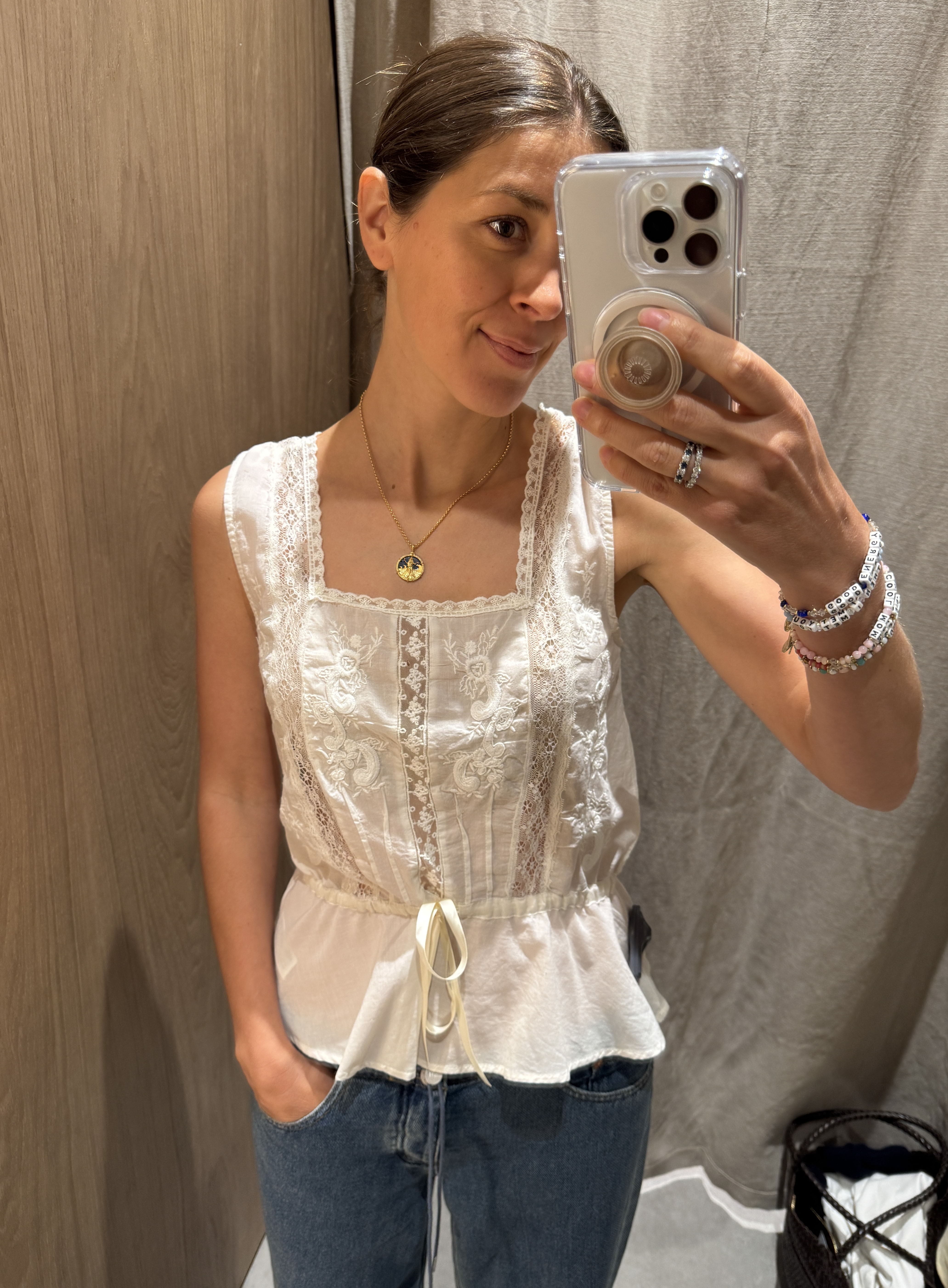 Woman in pretty embroidered top