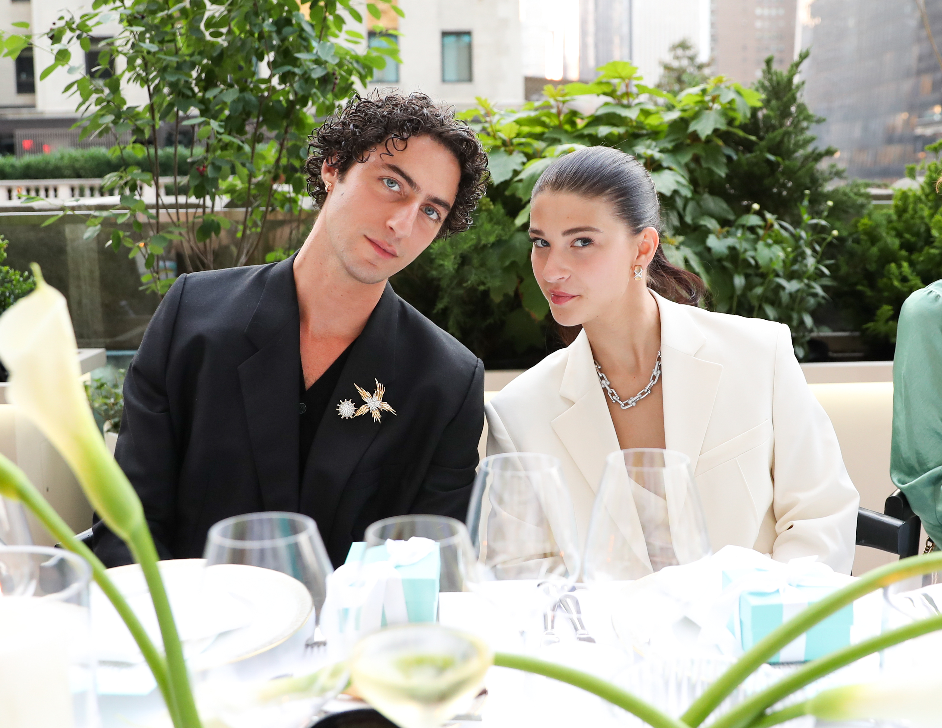 guests pose at a Tiffany & Co. dinner