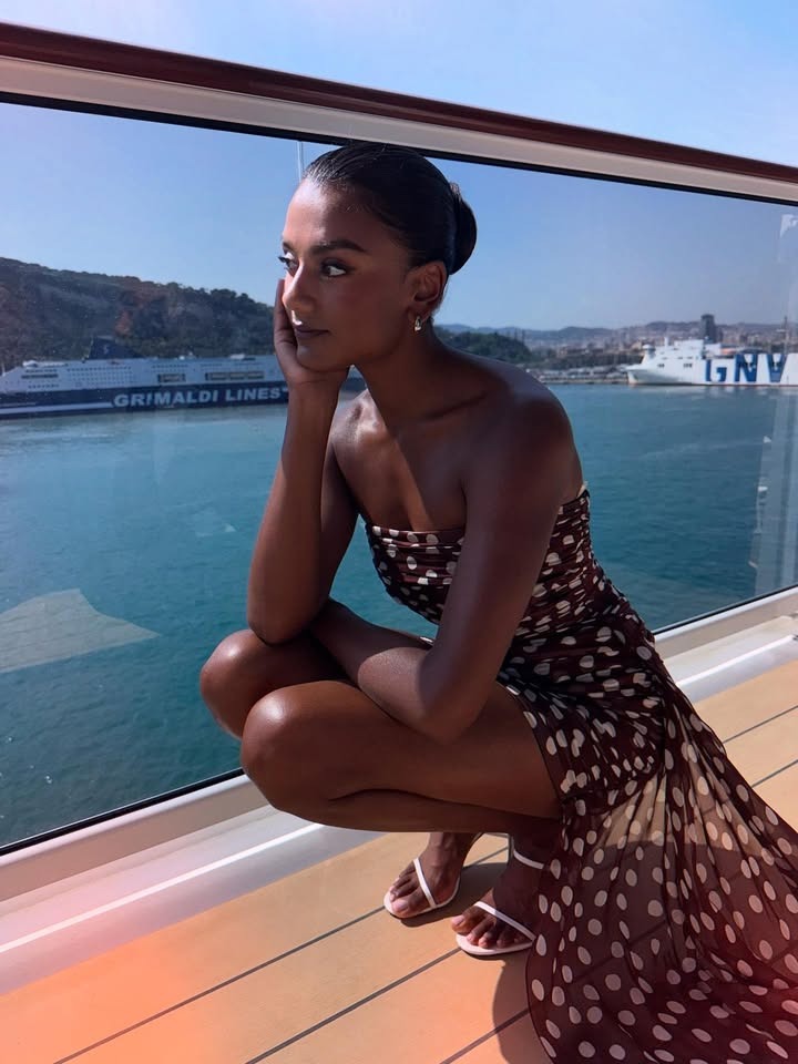 Simone Ashley wearing a polka dot dress