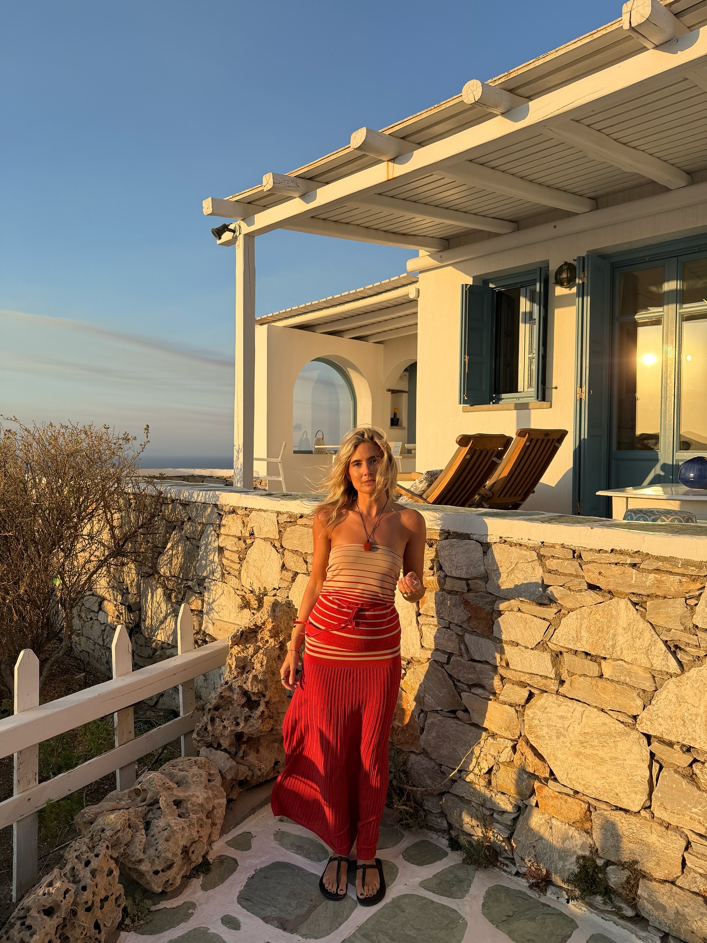 An image of @lucywilliams02 wearing t-bar sandals with a red striped set.