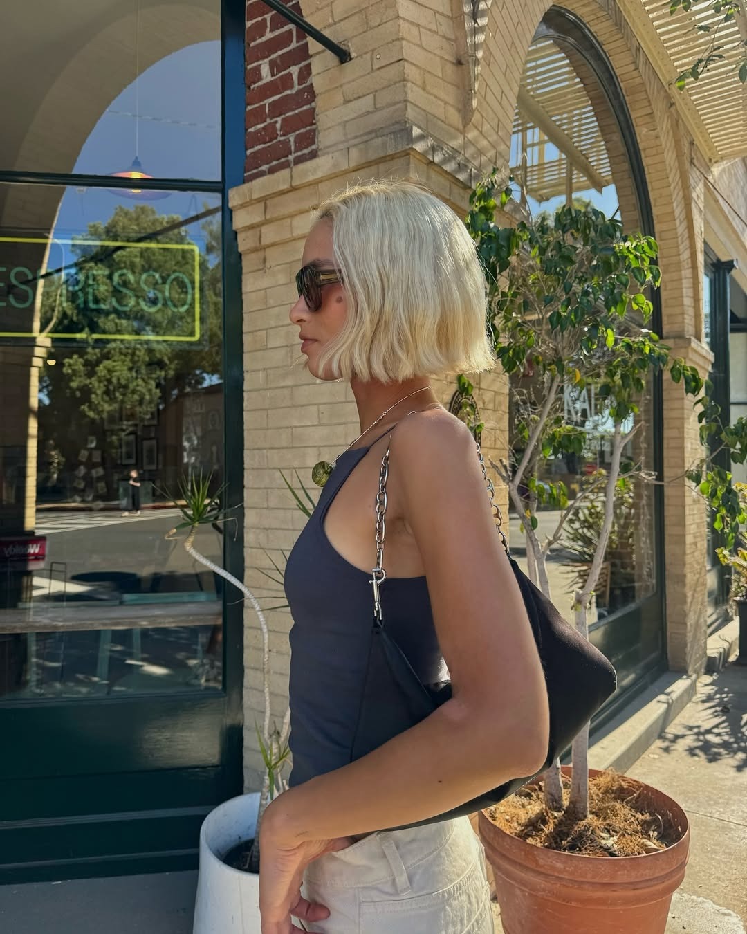 An image of Caitlin Miyako with a tousled Riviera bob hairstyle.