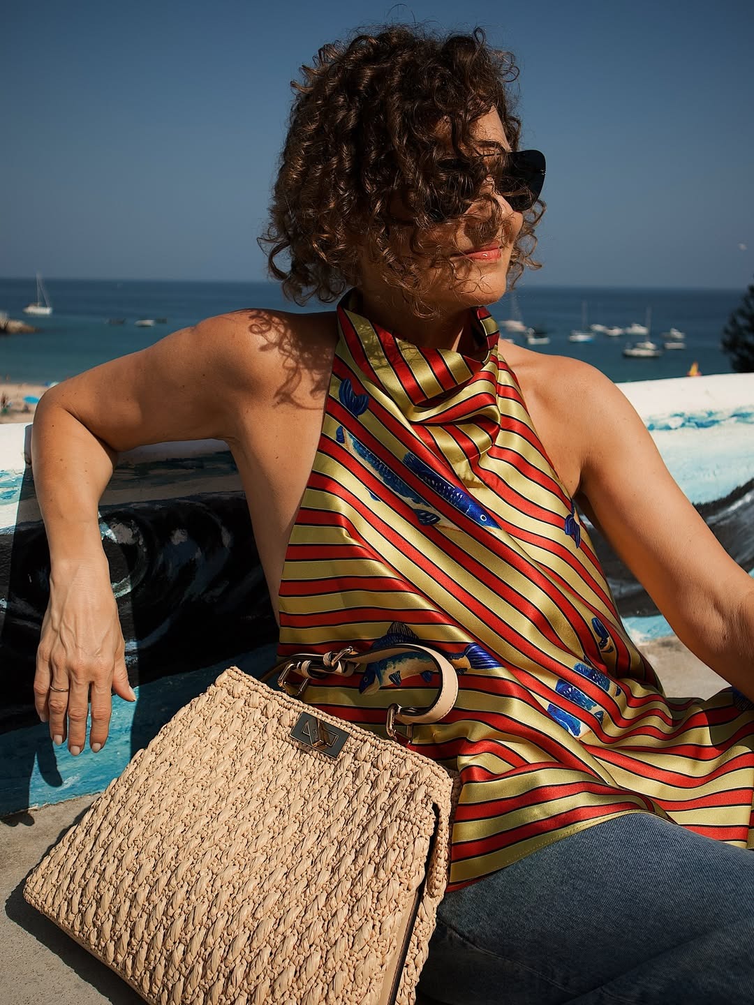 An image of Renia Jaz with a Riviera bob hairstyle.