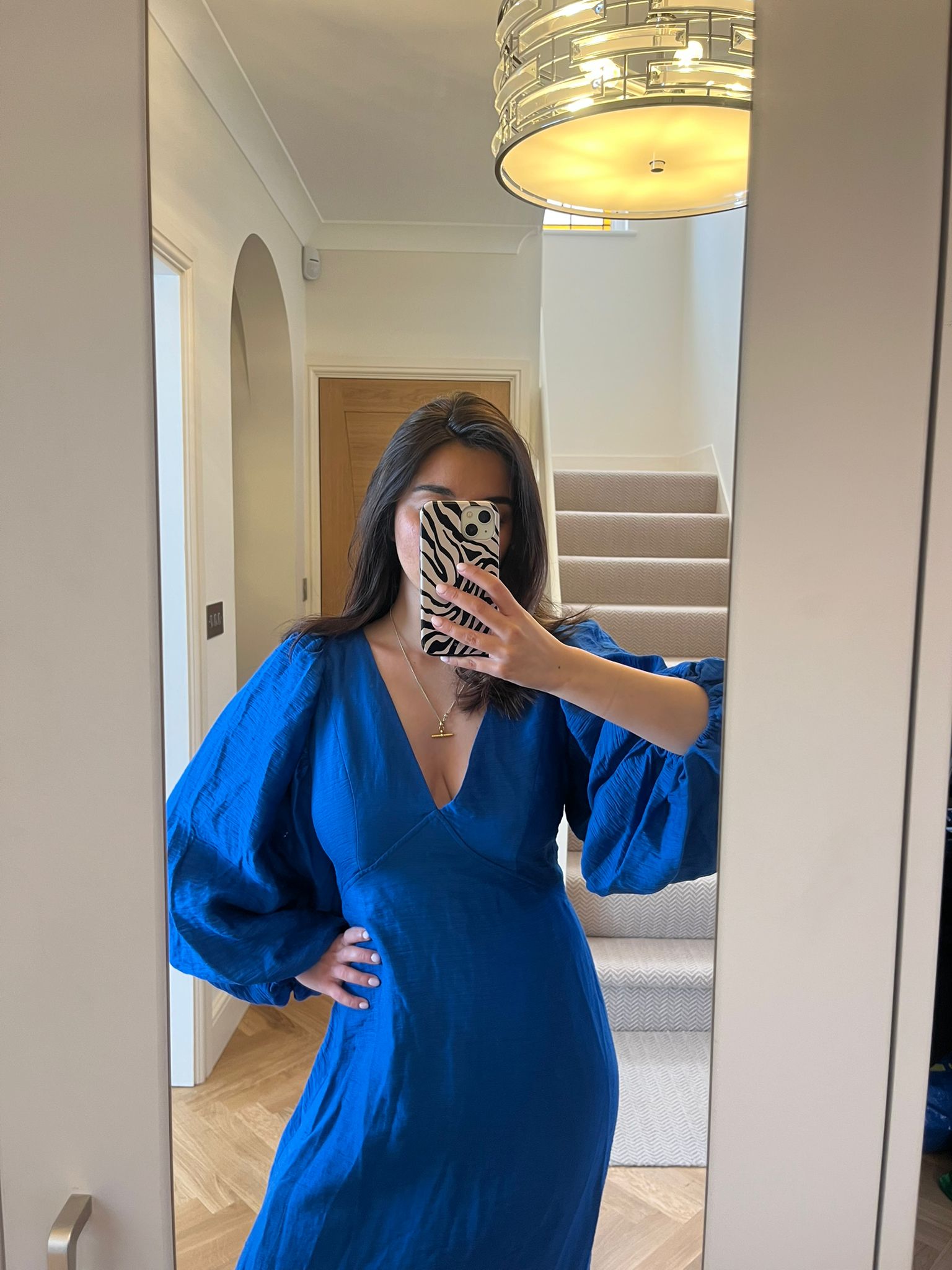 woman wearing electric blue dress