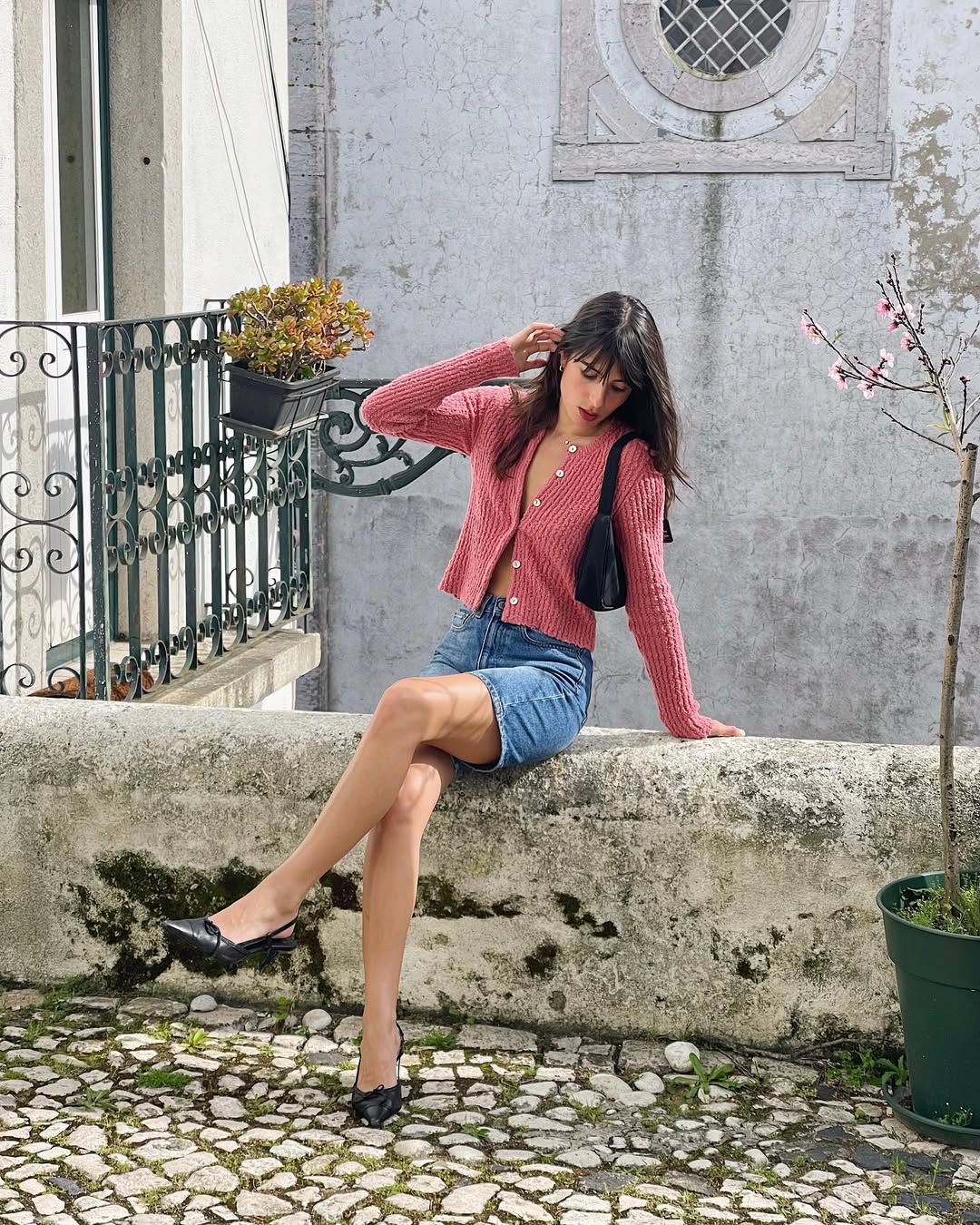 What to wear in Provence outfit ideas - Tamara in coloured cardi and denim shorts