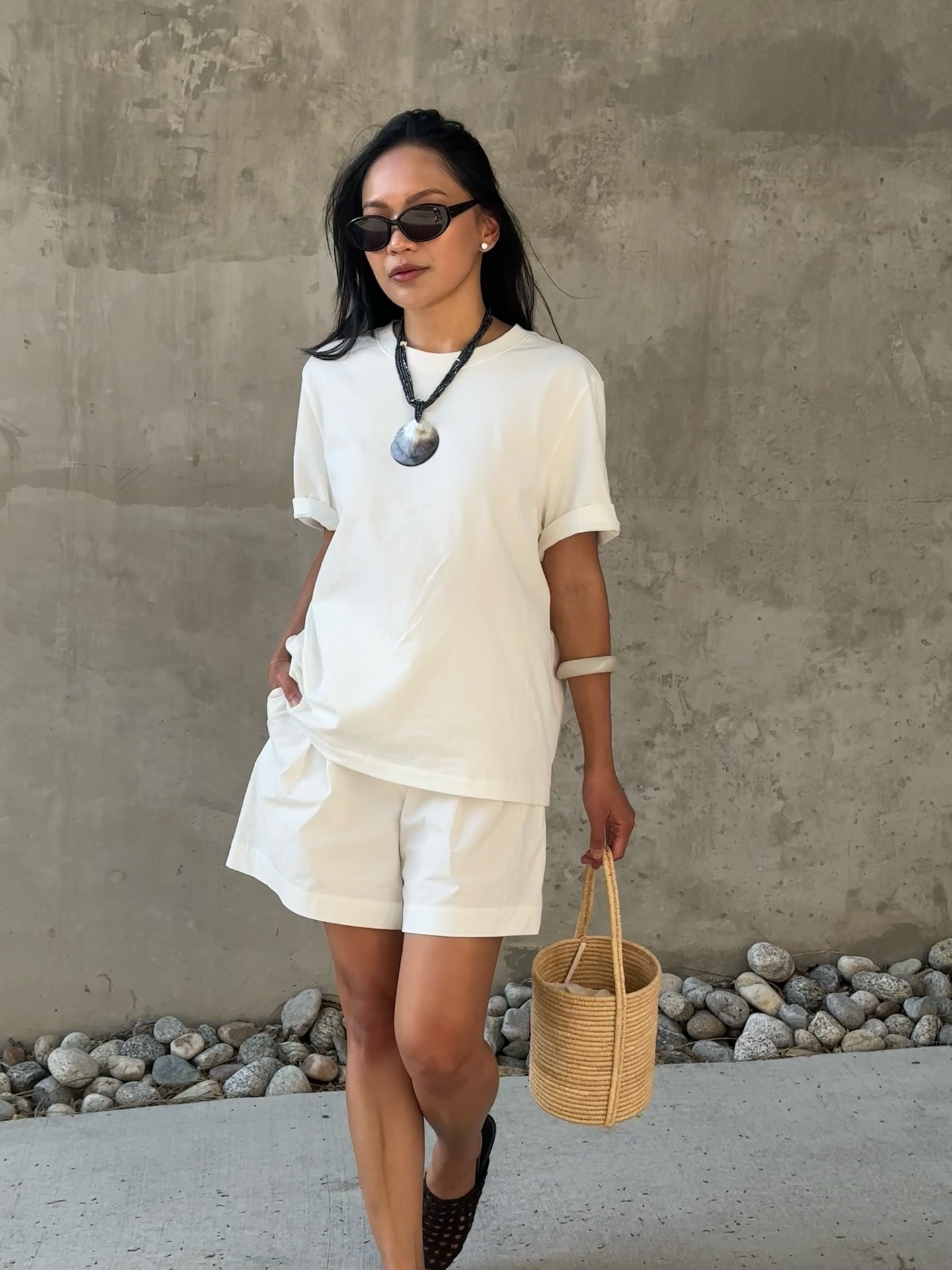 Dawn Tan wears an all-white summer outfit.