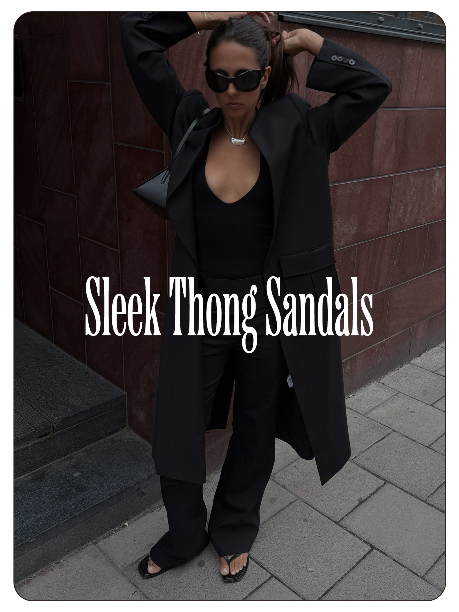 A photo of Hanna MW wearing a black outfit with sleek thong sandals.