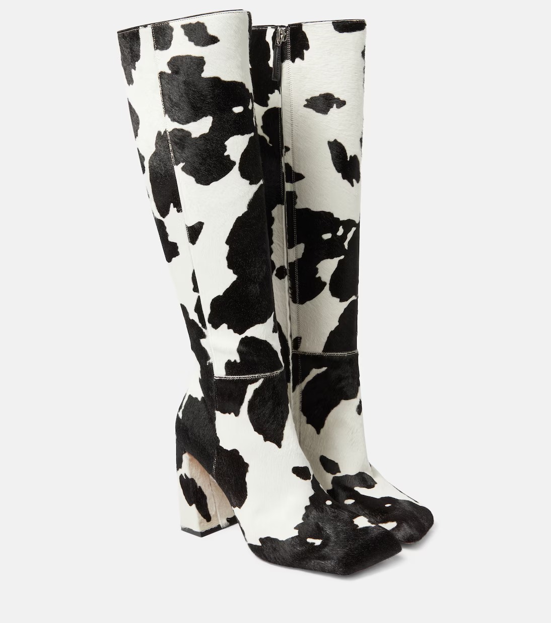 Cow print knee high boots 