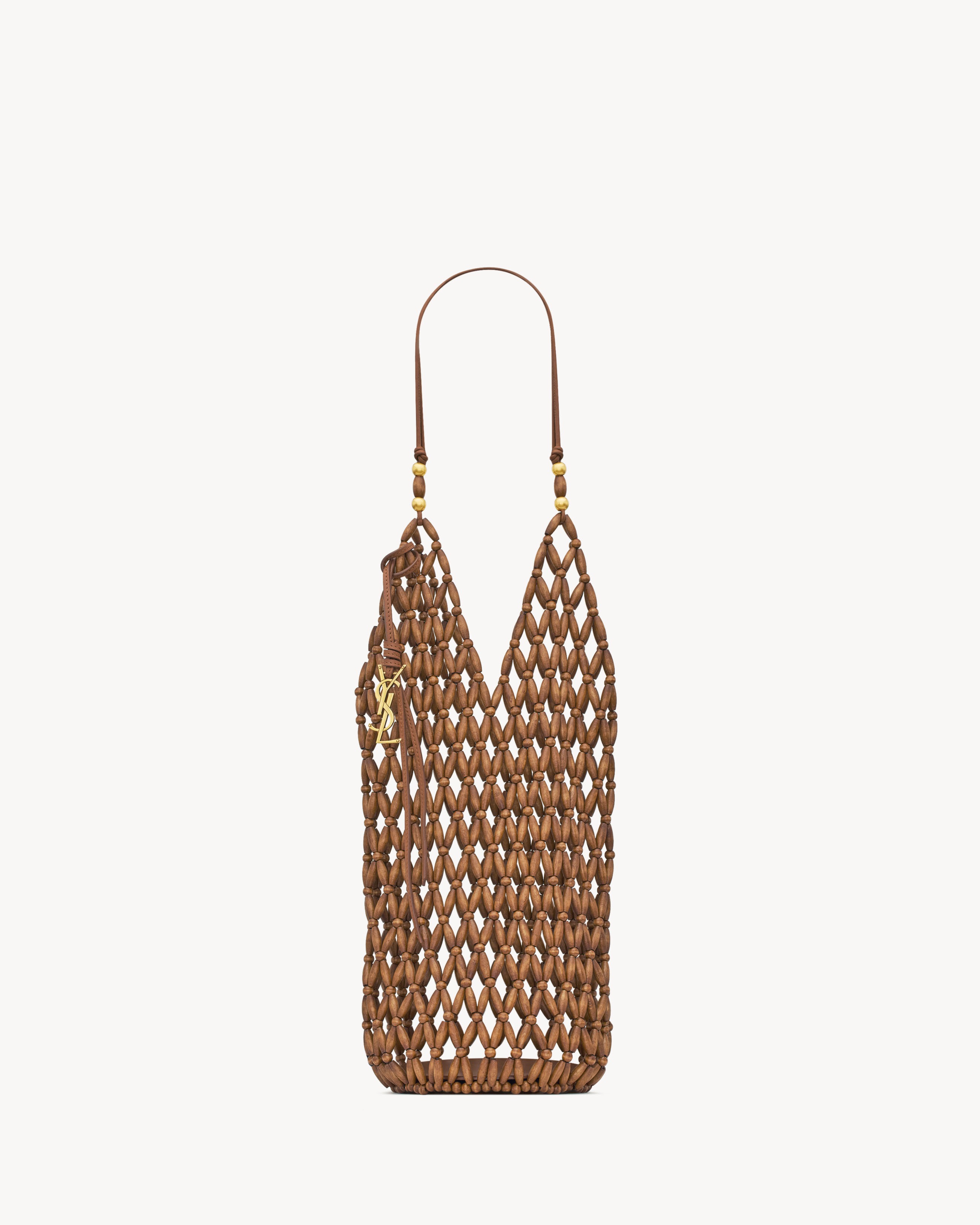 Saint Laurent, supple bucket in wood beads
