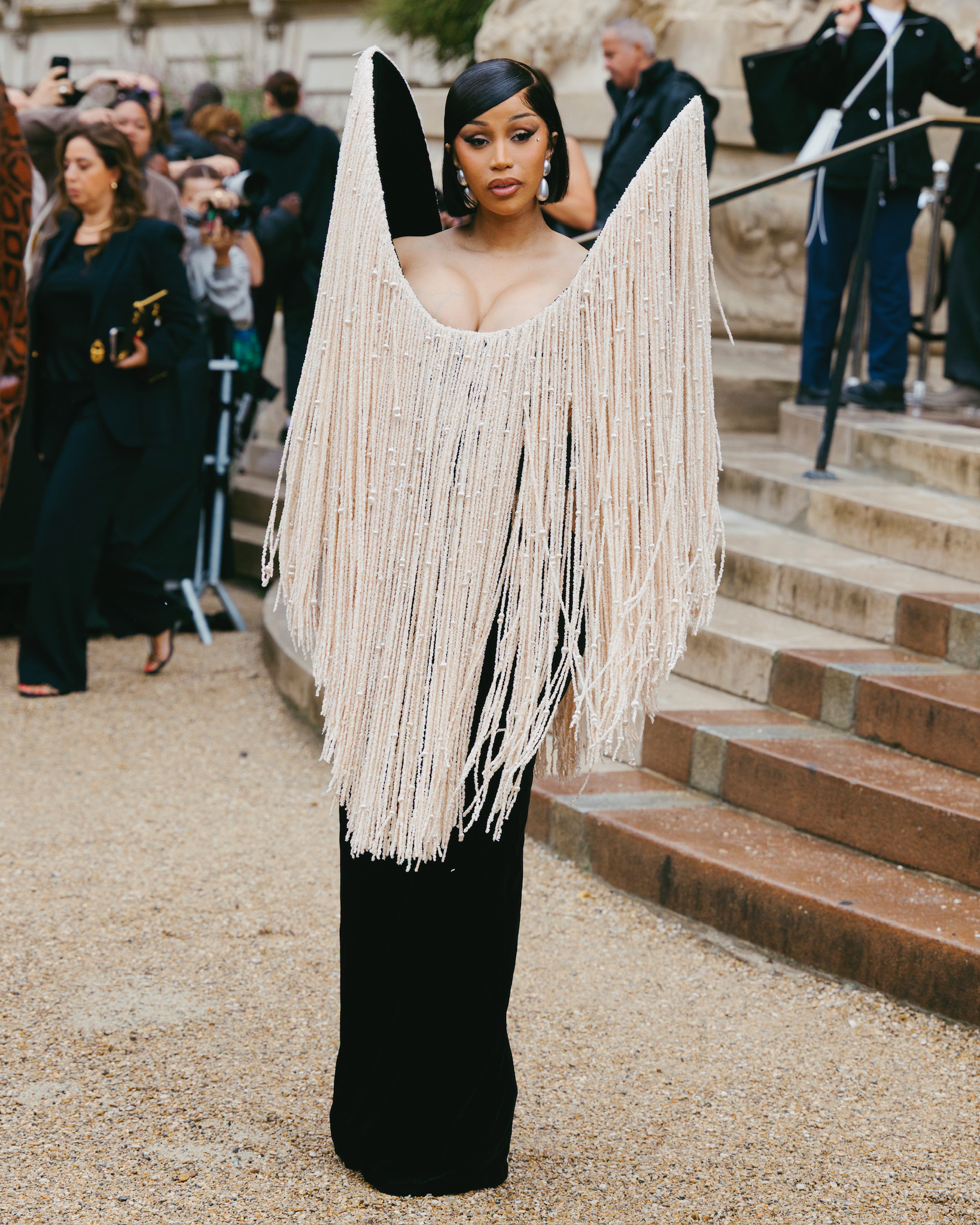 Cardi B wearing a Schiaparelli dress at the brand's FW25 Haute Couture show in Paris.