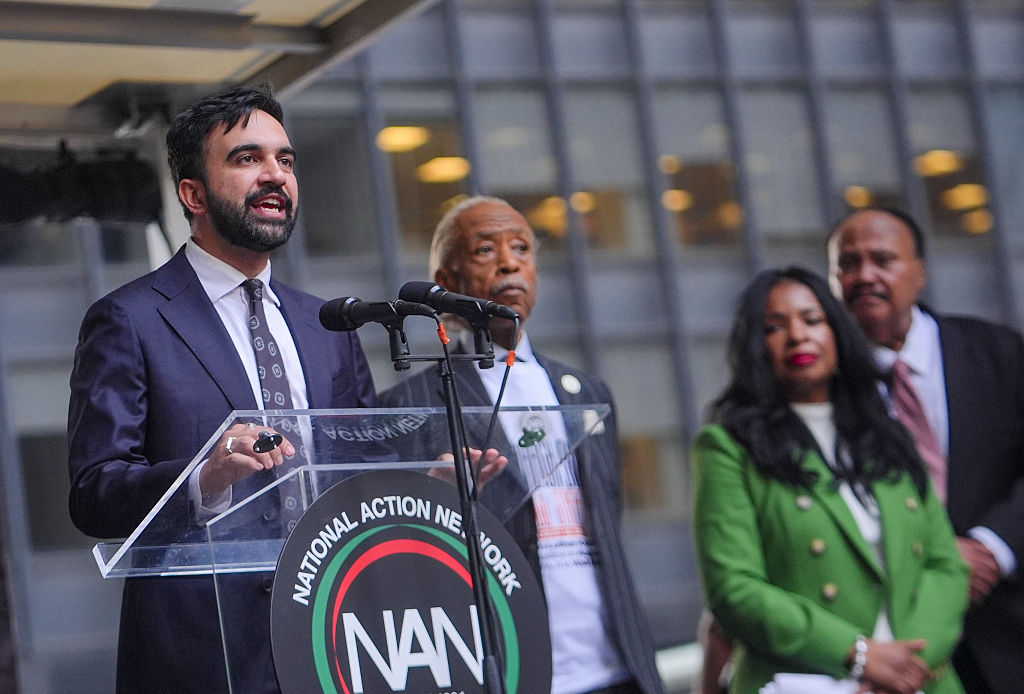 Demonstrators march for economic justice to Wall Street in New York City