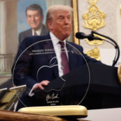 Apple made a 24k gold and glass statue for Donald Trump