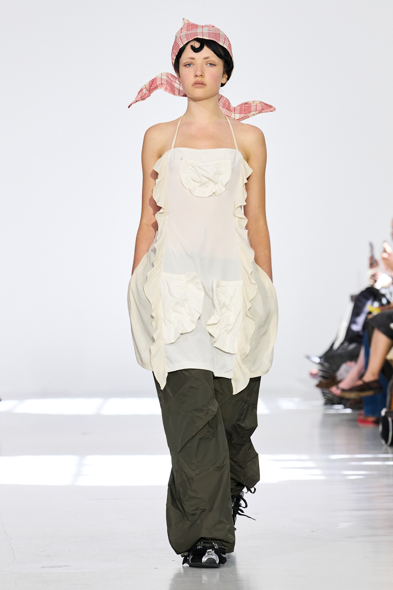 Model wears a headscarf on the Rave Review spring summer 2026 runway