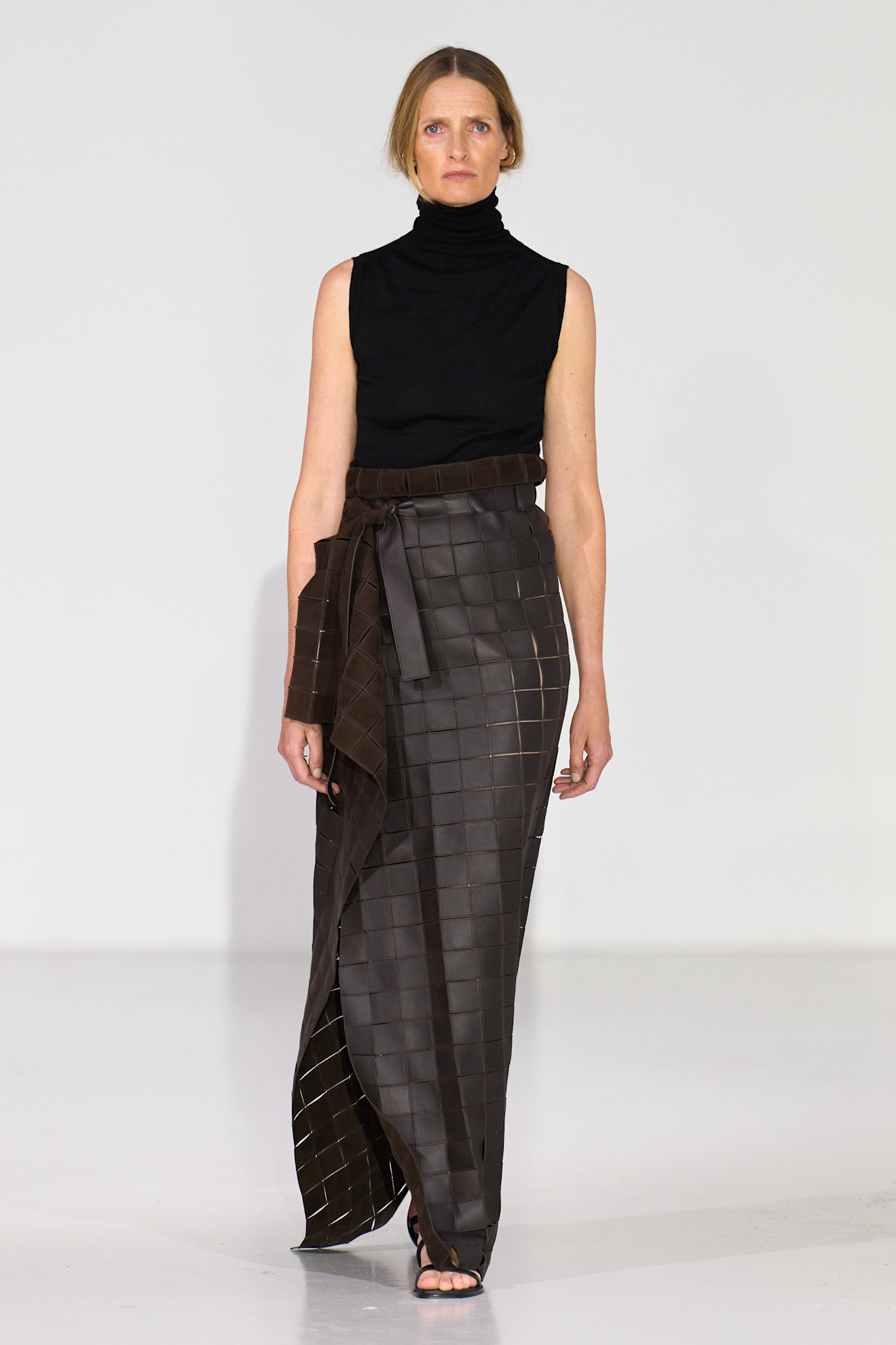 Model wears a woven garment on the Dalsjo spring summer 2026 runway.