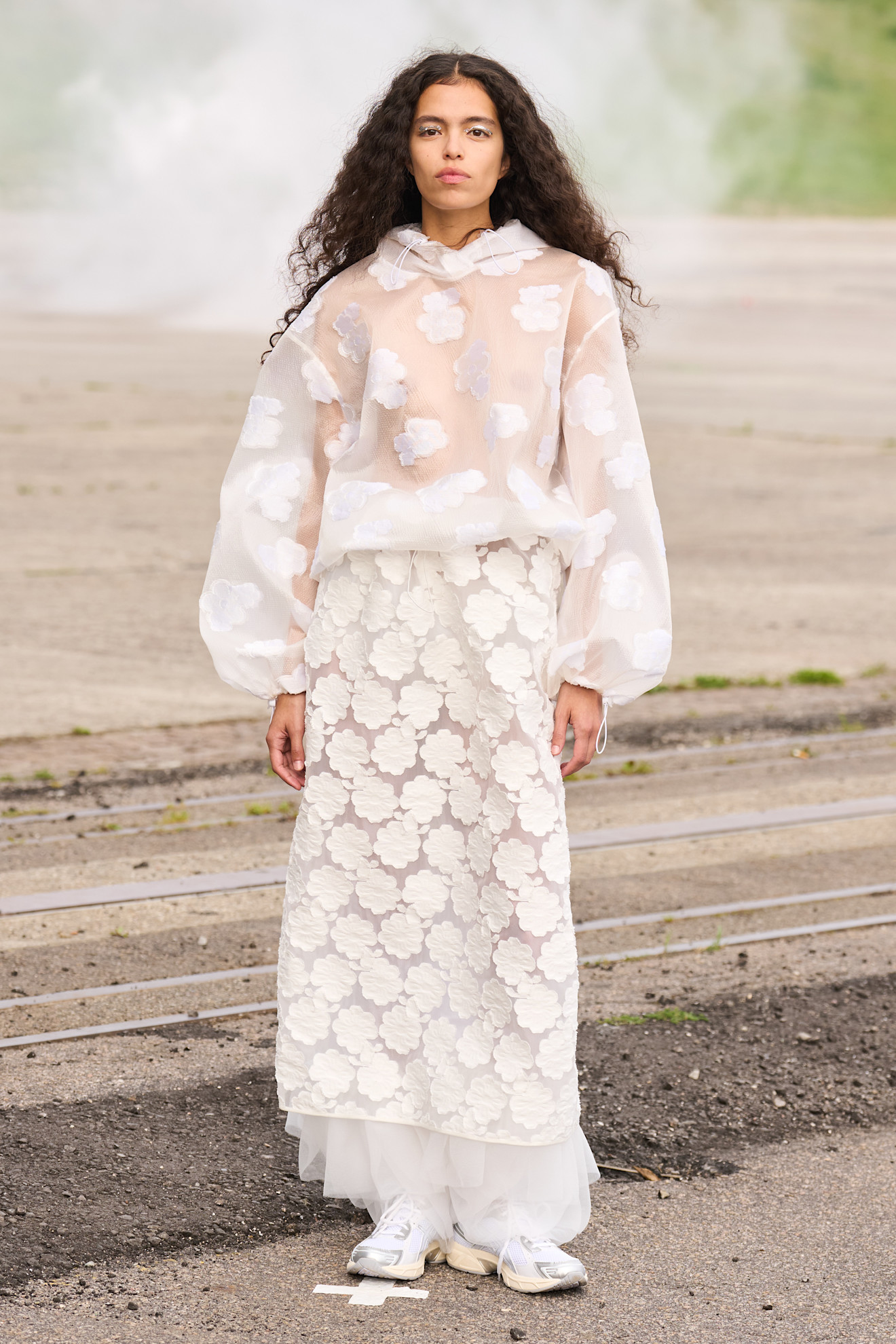 Model wears textured florals on the Cecilie Bahnsen spring summer 2026 runway.