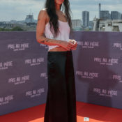 Fashion People Are Elevating "Boring" White Tanks By Wearing Them With This Elegant Skirt Trend Instead of Jeans