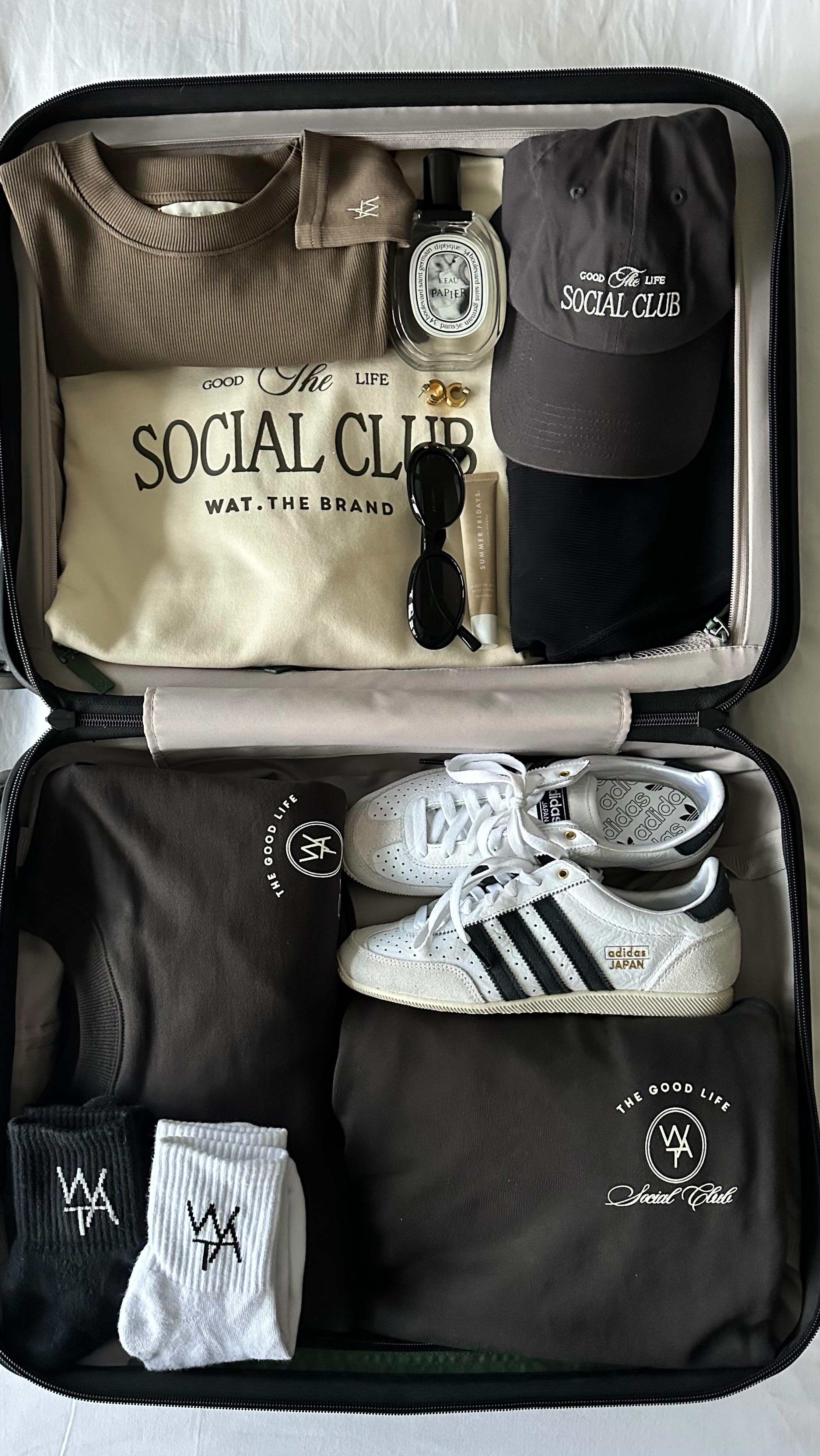 Influencer @wearetwinset wears Adidas Japan Trainers with a denim shirt and barrel leg jeans.