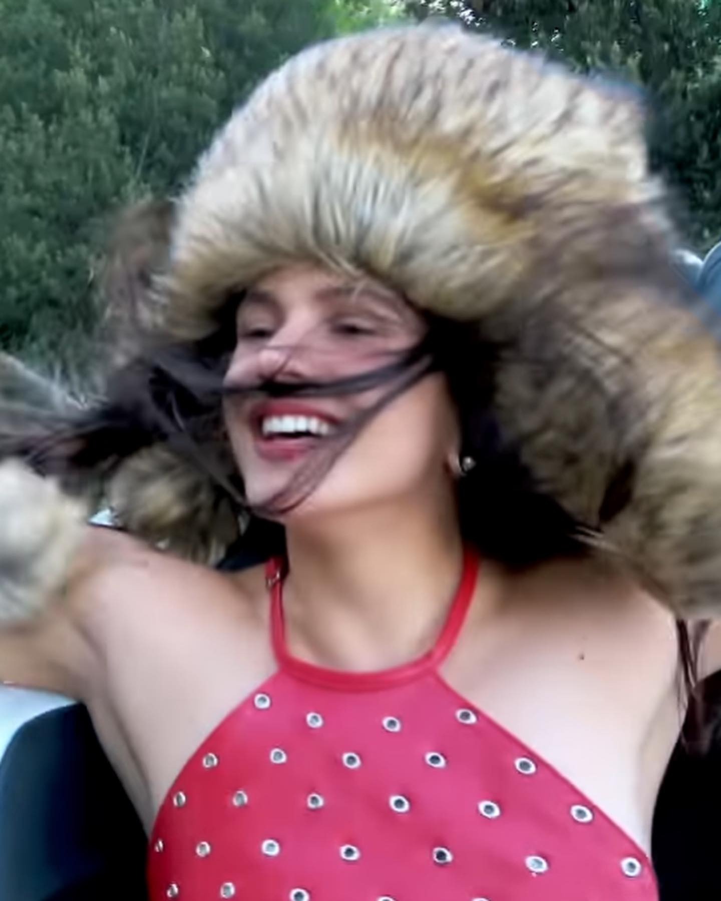 Rosalía wearing a custom studded Gimaguas top.