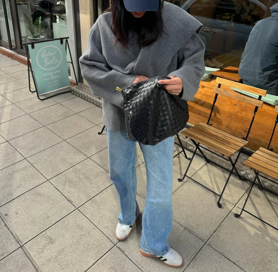 An influencer wearing adidas sneakers.