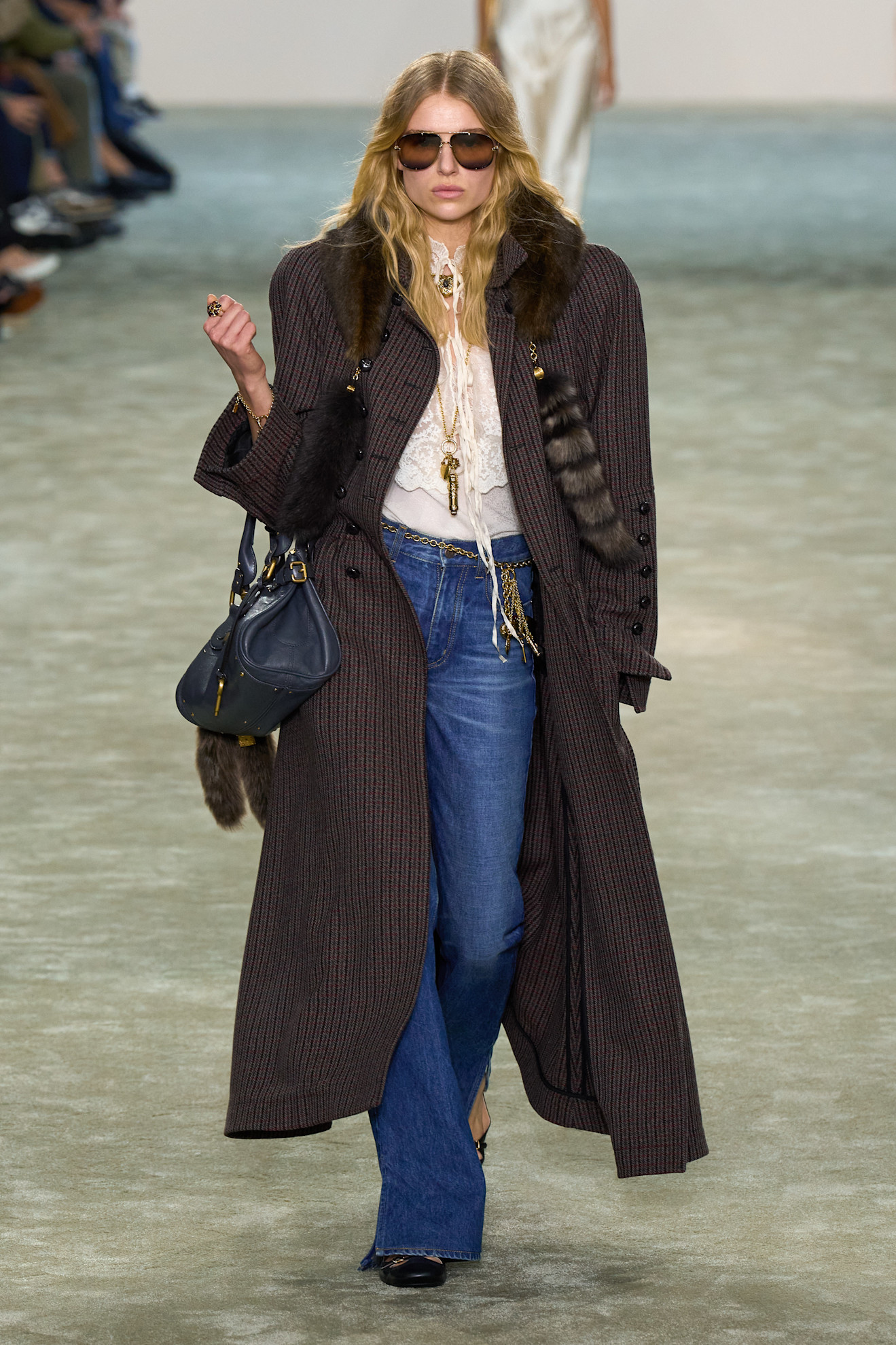 An image of a key autumn 2025 jeans trends on the Chloé runway.