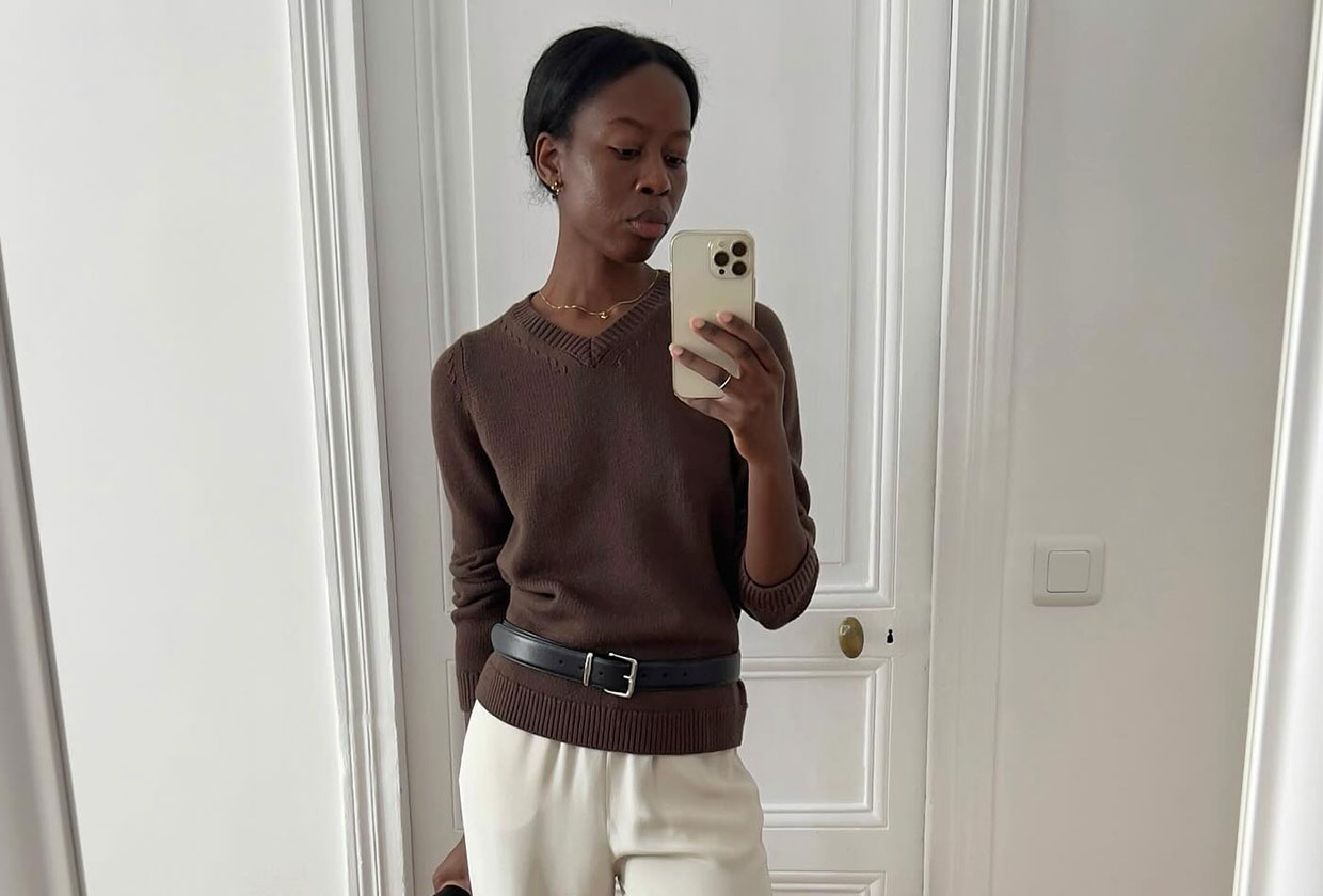 A French woman in a brown sweater