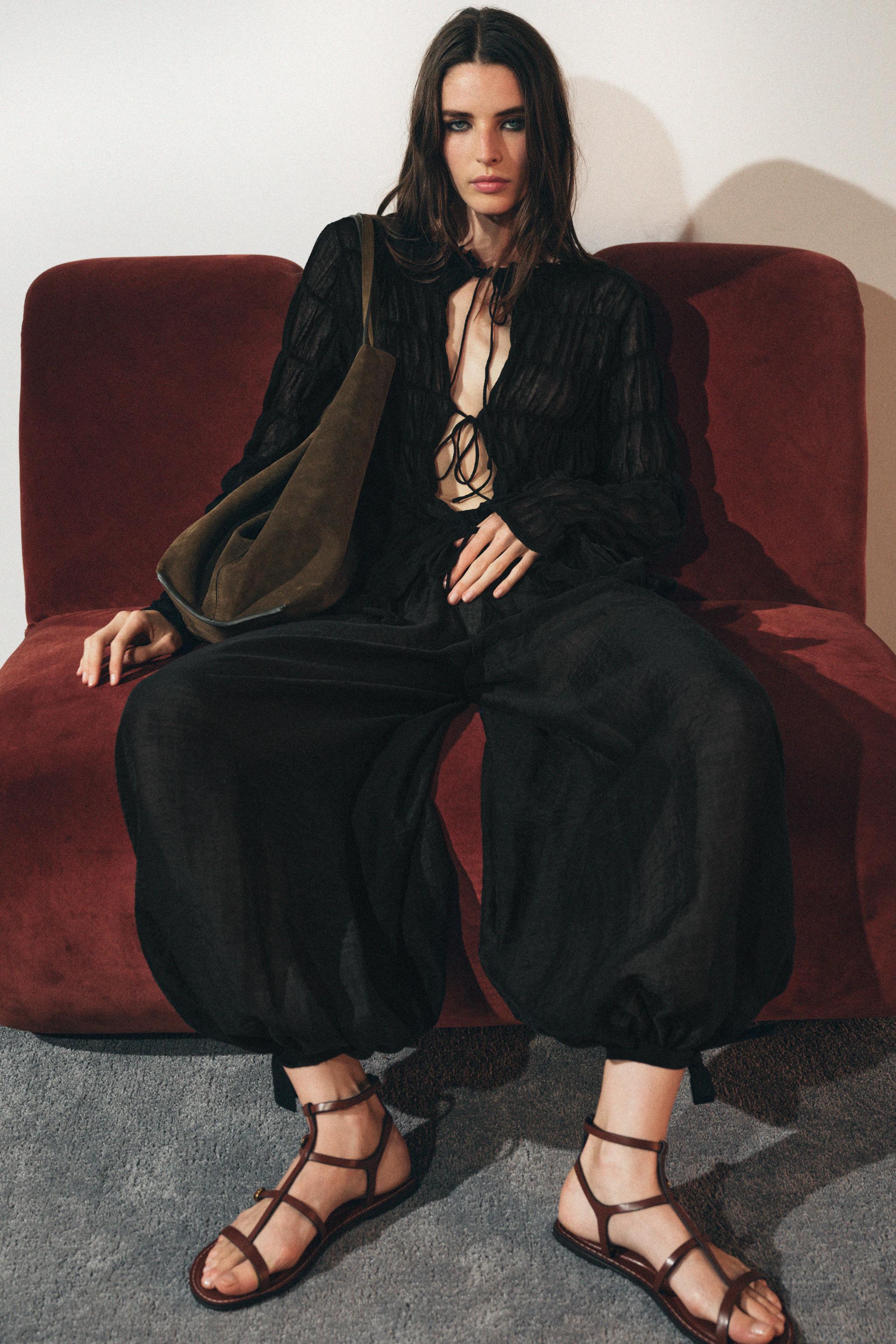 Semi-Sheer Gathered Knit Top