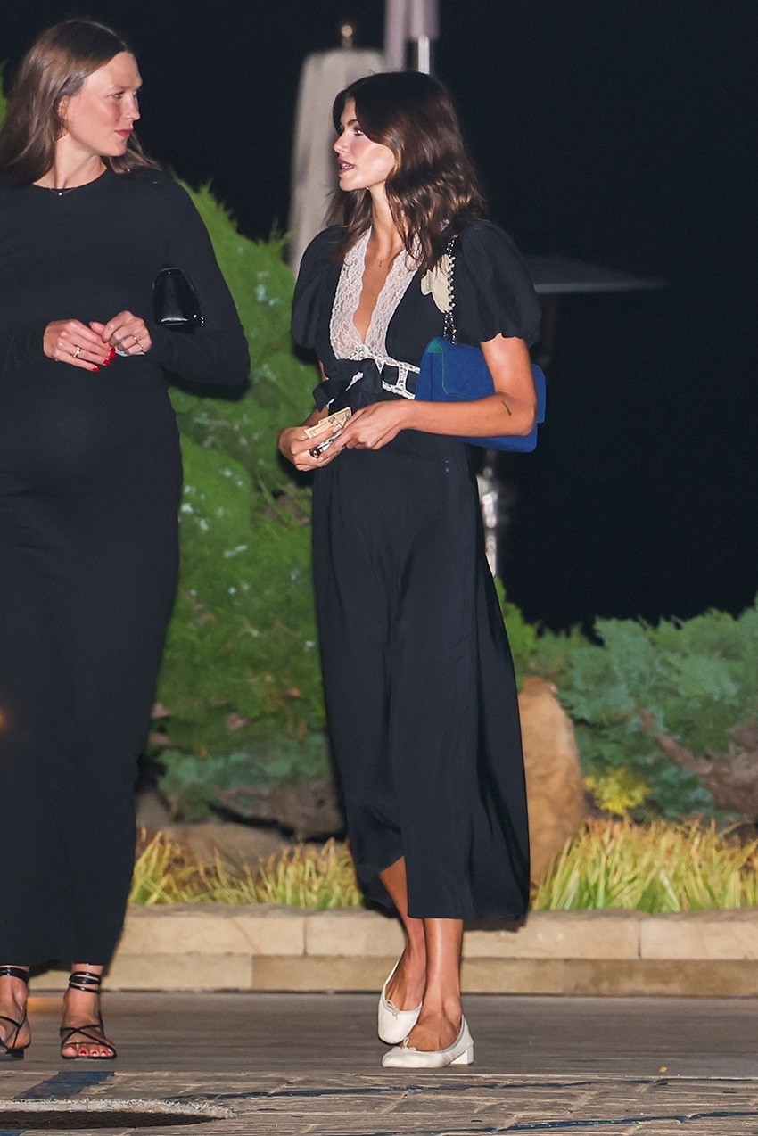 Kaia Gerber wearing a lace-trimmed black dress with white ballet pumps to dinner with Karlie Kloss at Nobu Malibu