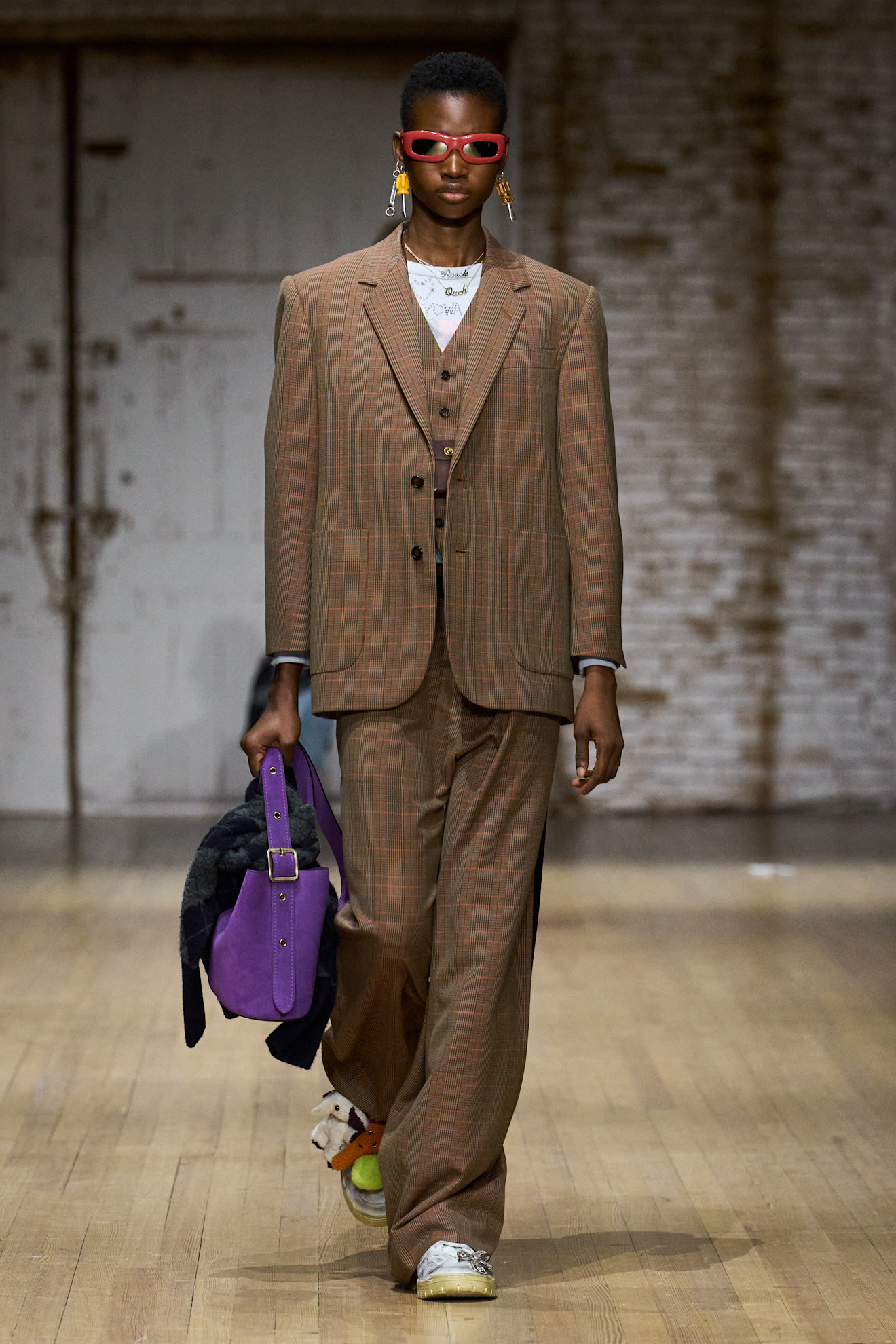 Coach Fall Winter 2025, Ready to Wear show featuring suede bags.
