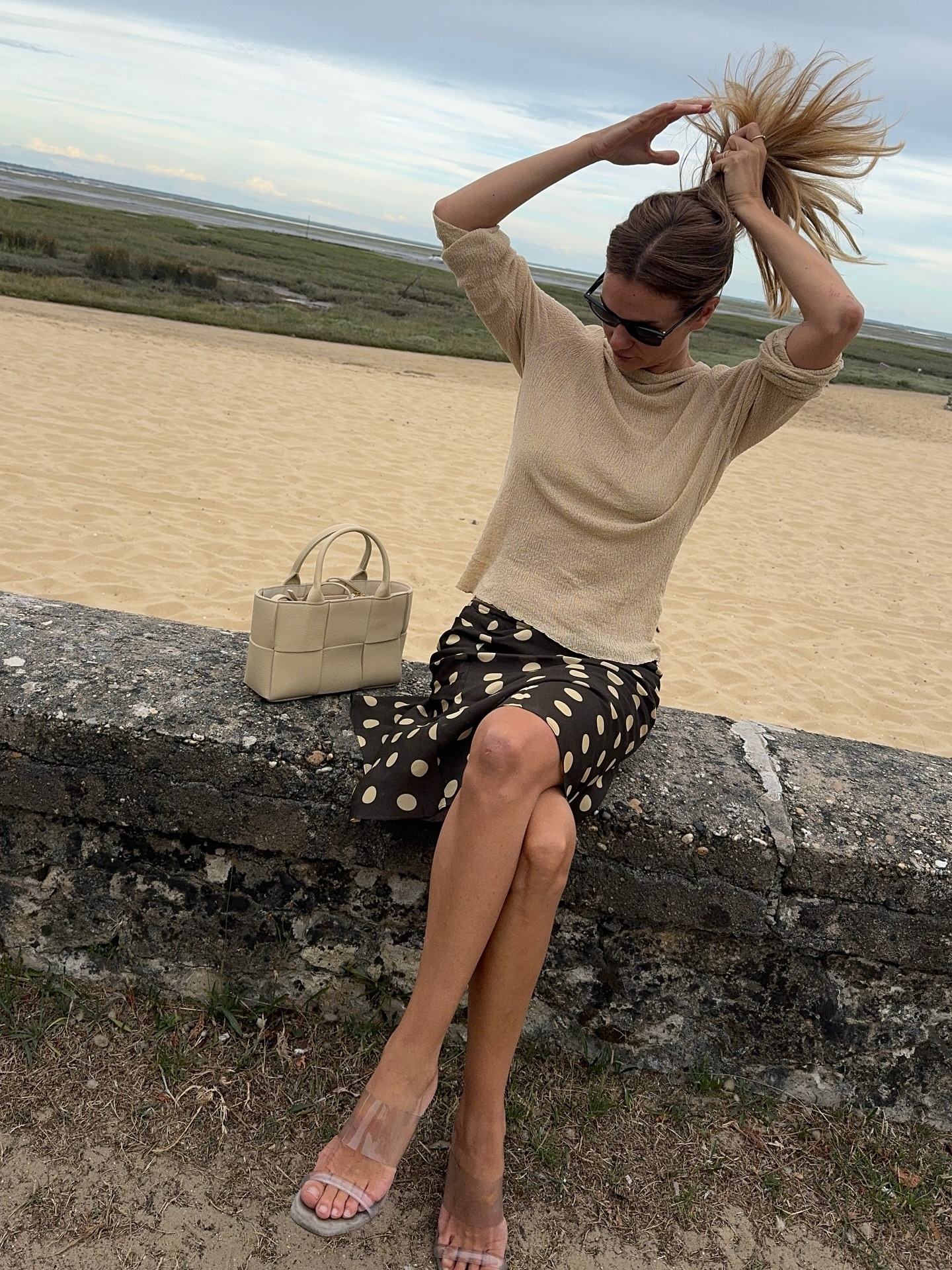 French influencer wearing With Jean brown polka dot Penny Skirt