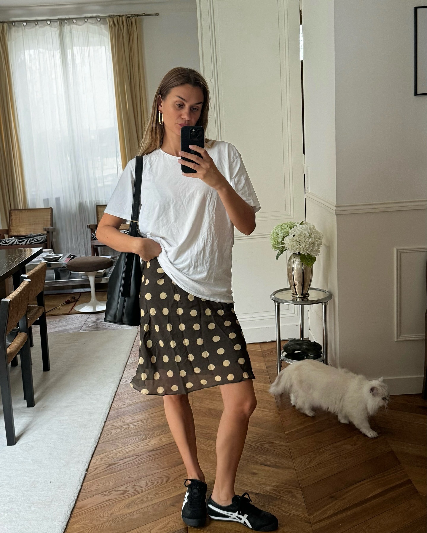 French influencer wearing With Jean brown polka dot Penny Skirt