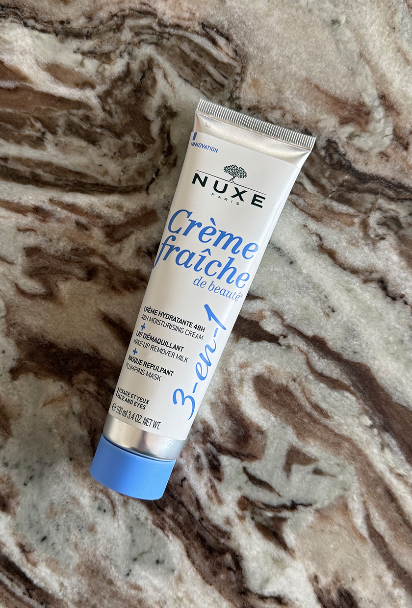 Nuxe creme fraiche cream on marble table