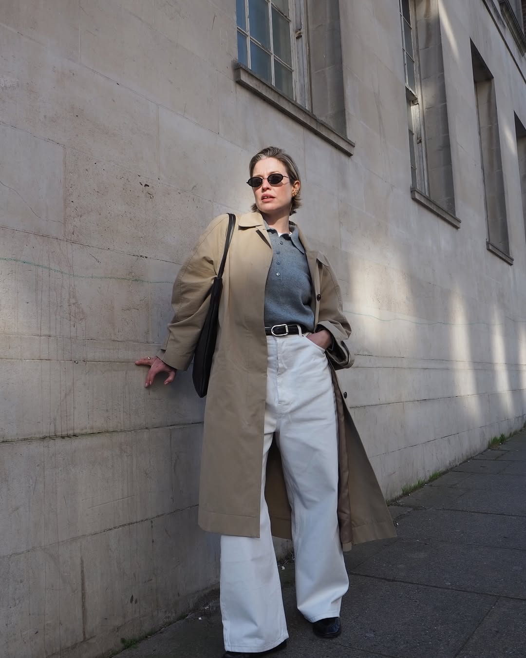Alexis in a trench and white jeans
