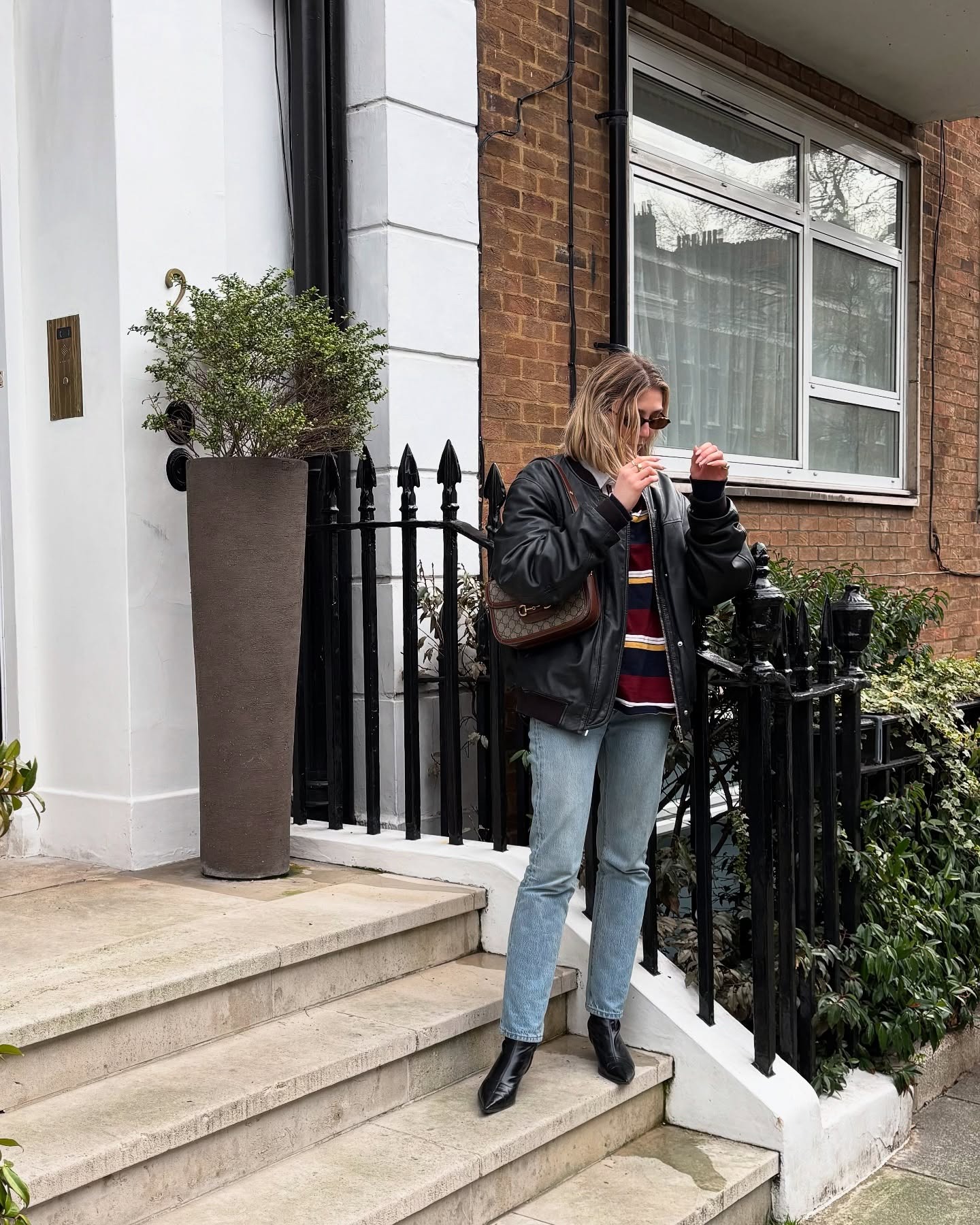 Fashion person Lou Northcote wears a blue skinny jeans outfit