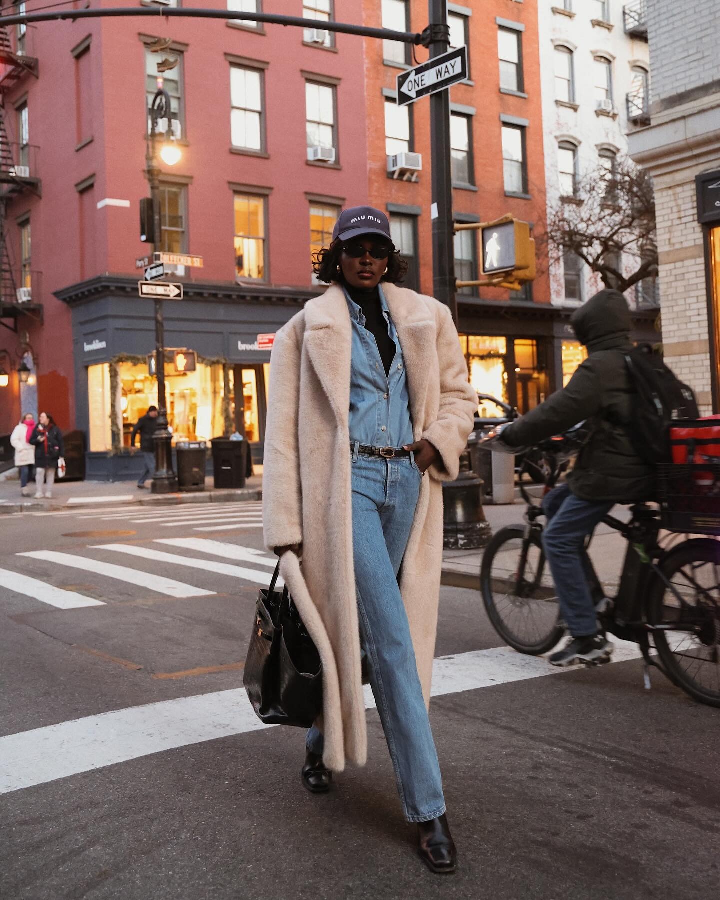 Fashion person Lefevre Diary wears a blue skinny jeans outfit